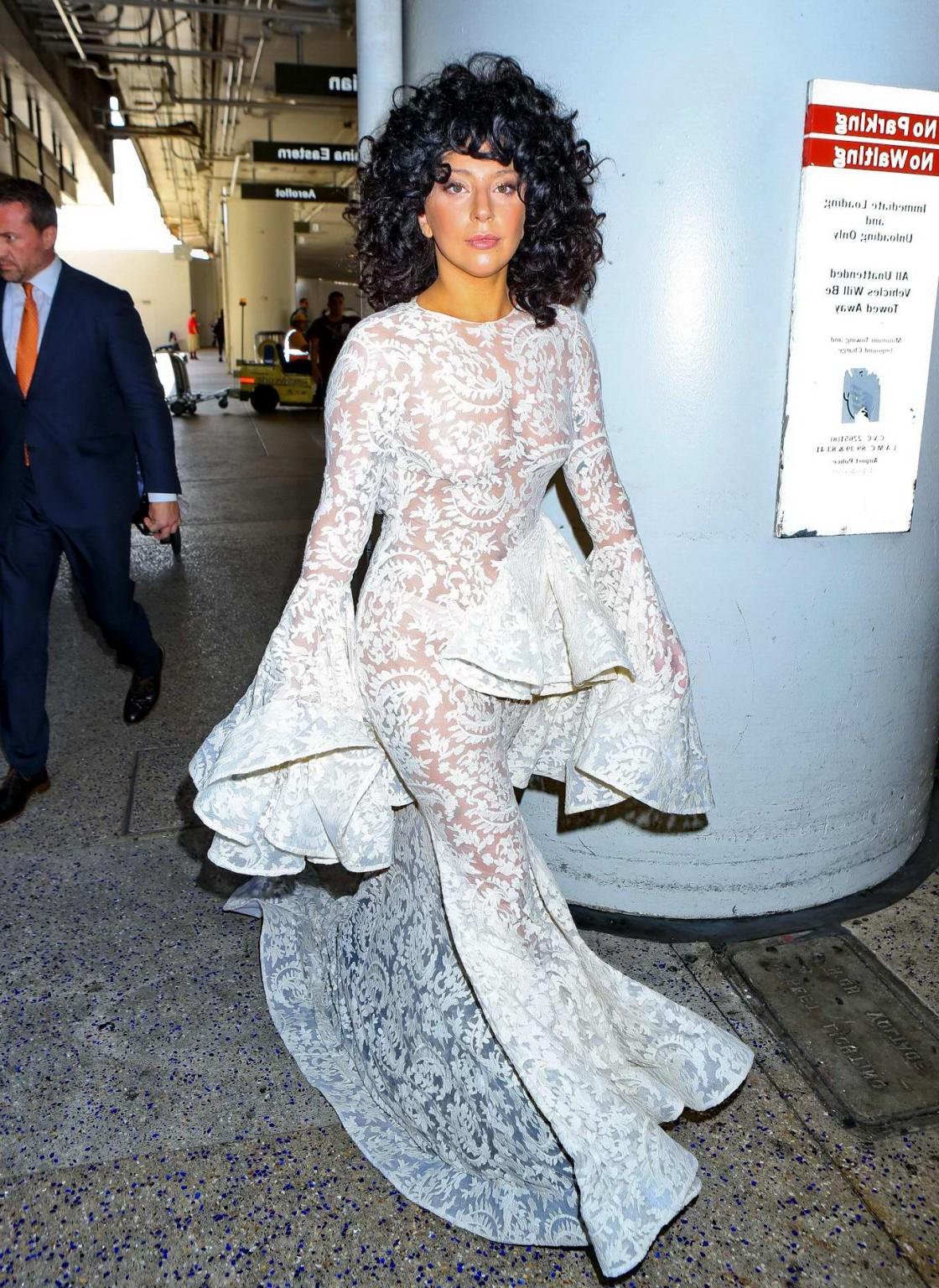 15P Lady Gaga shows off her boobs and ass wearing a see through lace dress at LAX Ai
