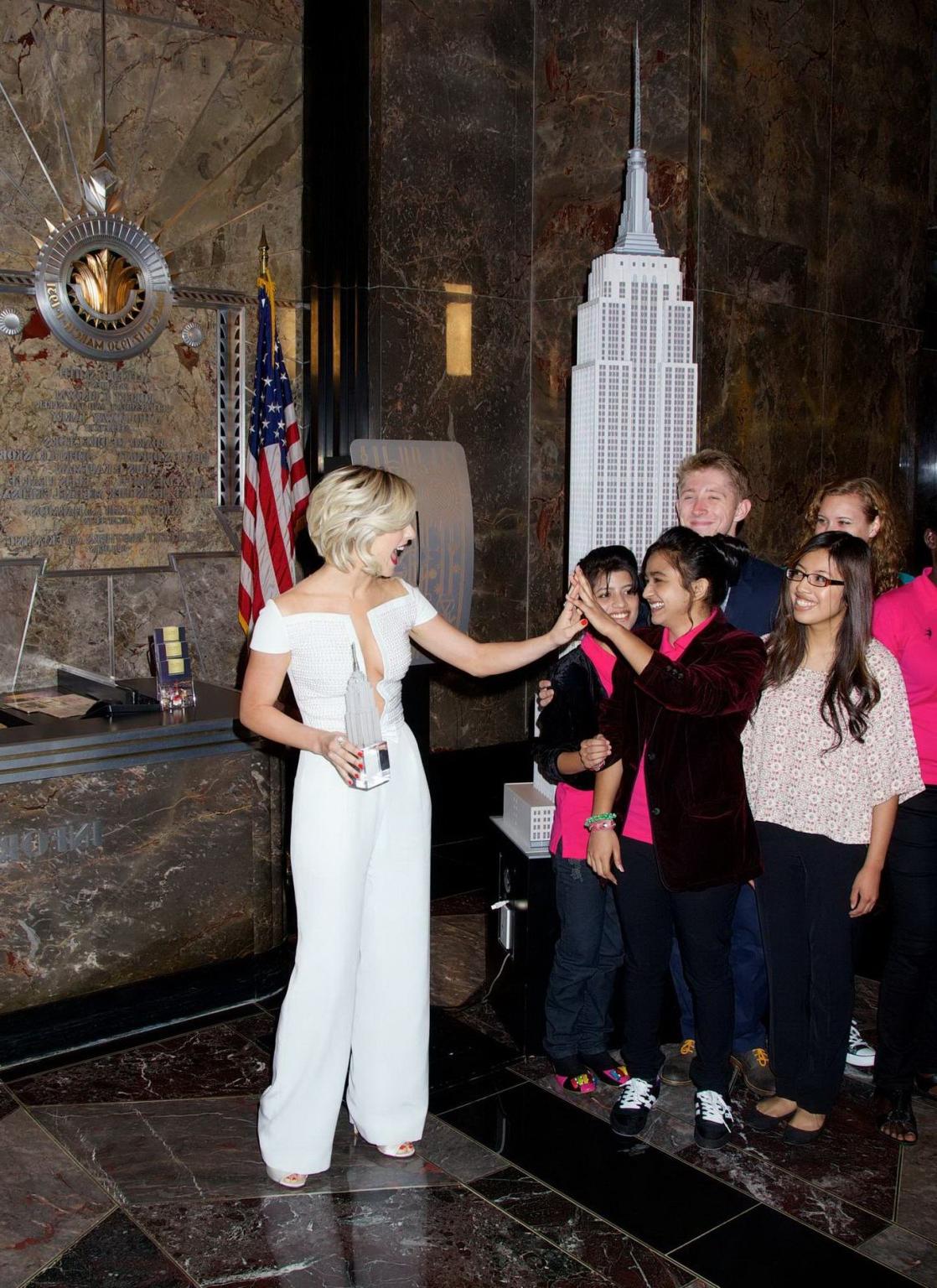 12P Julianne Hough braless shows huge cleavage in white low cut jumpsuit at Empire S