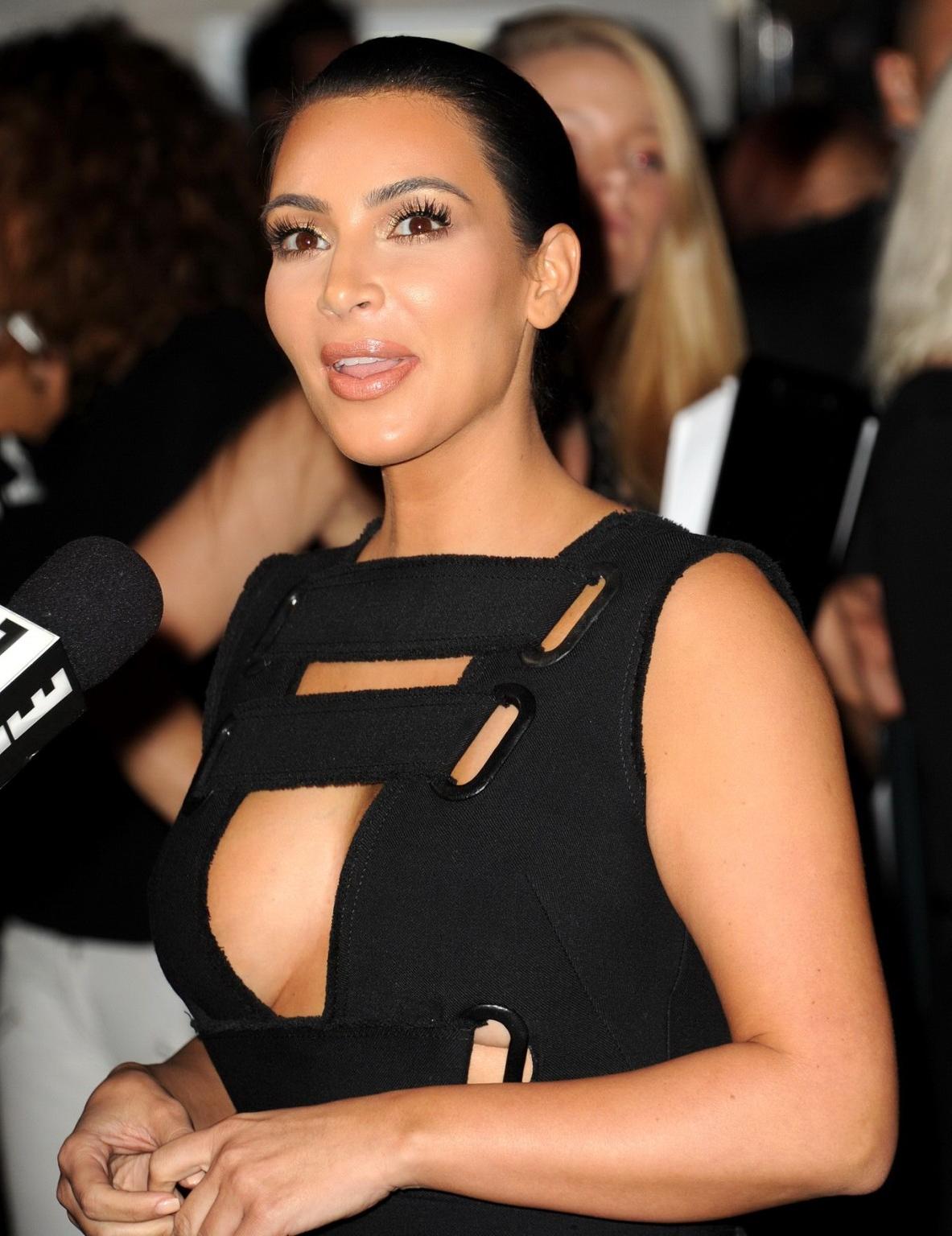 12P Kim Kardashian braless showing cleavage at Charlotte Tilburys Makeup Your Destin