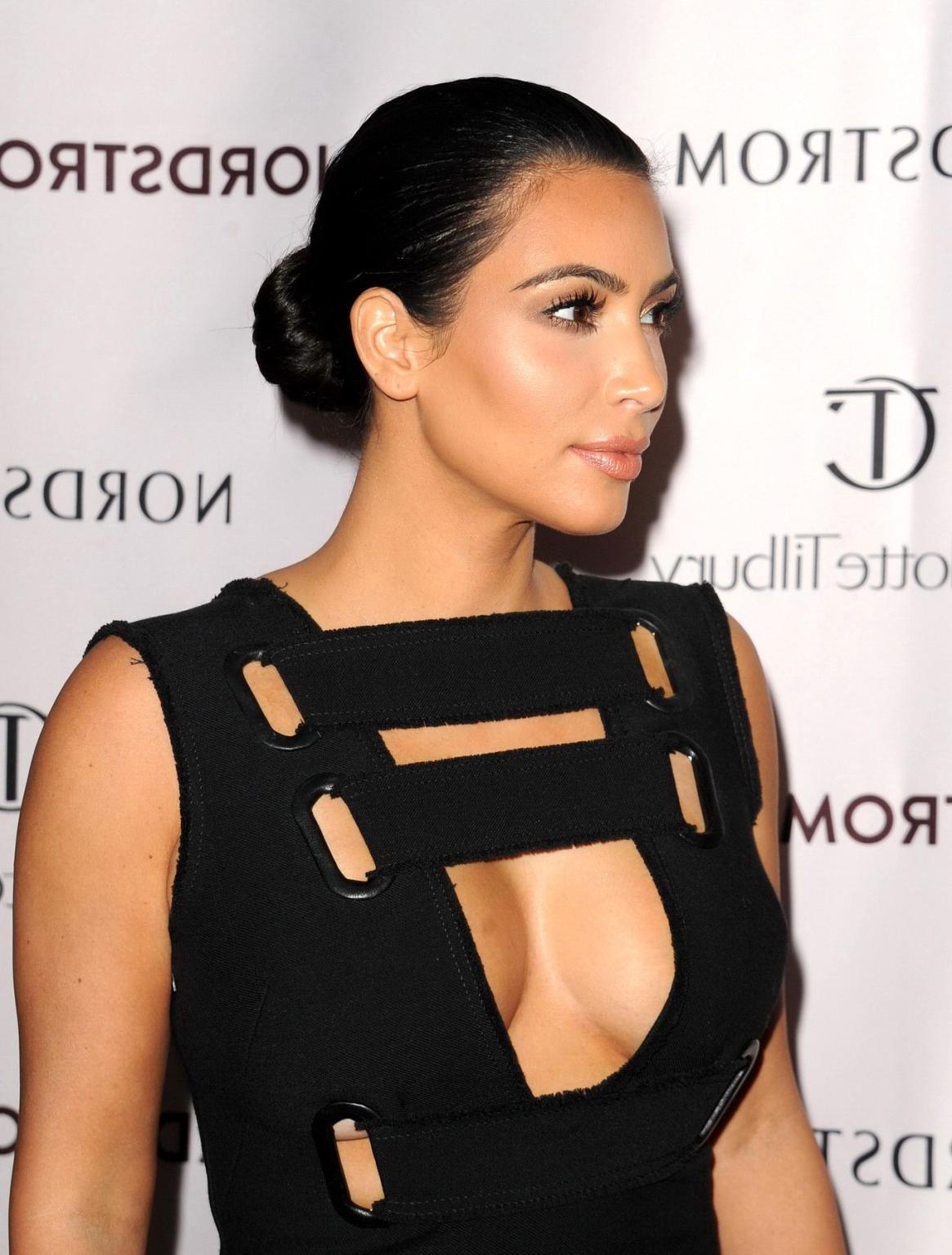 12P Kim Kardashian braless showing cleavage at Charlotte Tilburys Makeup Your Destin