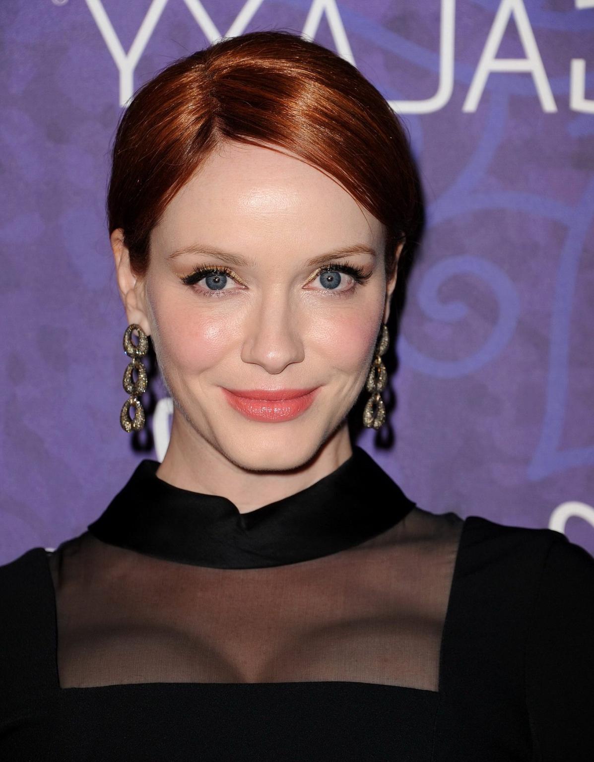 16P Christina Hendricks showing cleavage at the Variety and Women in Film Emmy Nomin