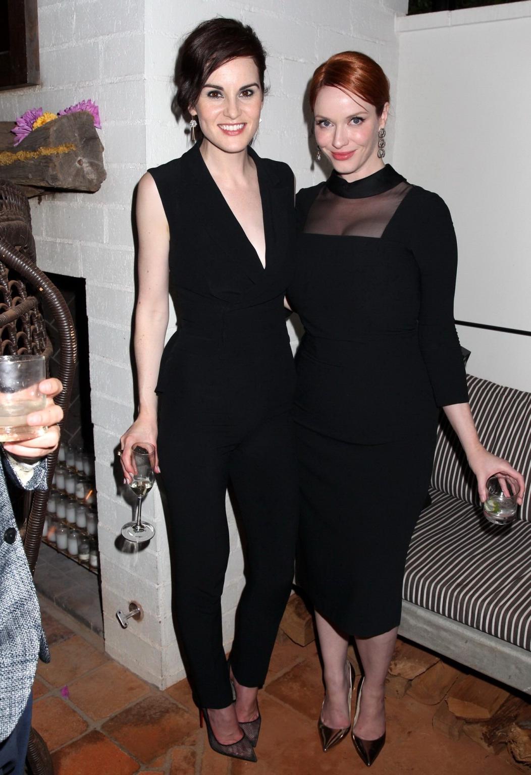 16P Christina Hendricks showing cleavage at the Variety and Women in Film Emmy Nomin