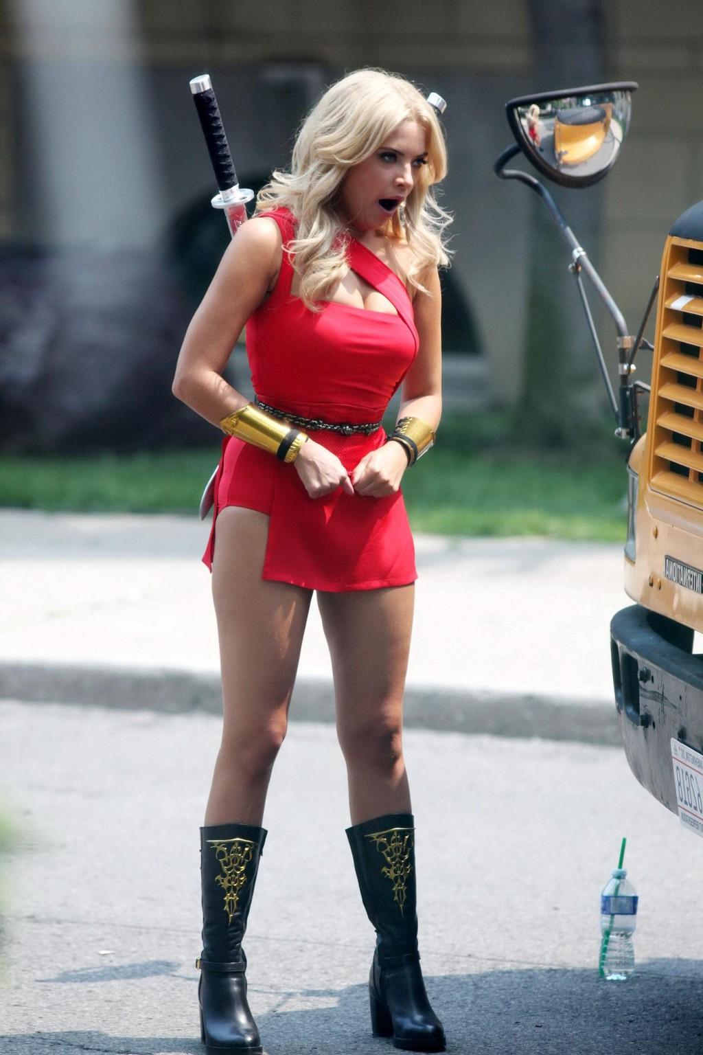 16P Ashley Benson shows off her ass and cleavage wearing a skimpy red outfit on the 