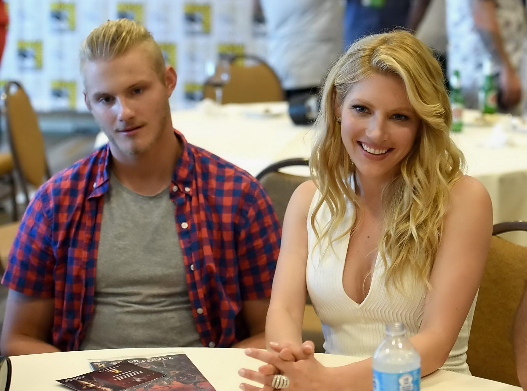 16P Katheryn Winnick showing big cleavage in a tight white dress at the Vikings Pres