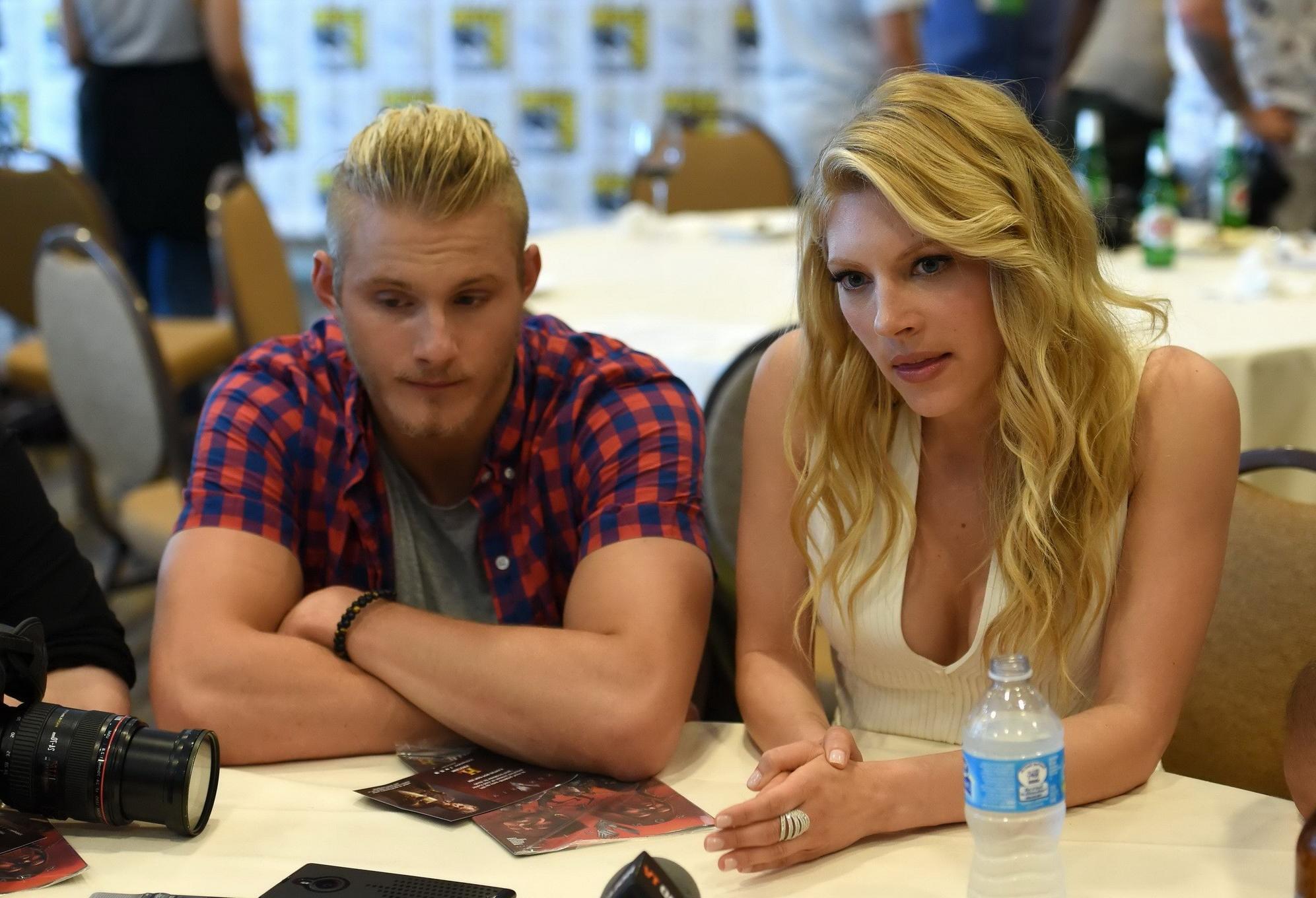 16P Katheryn Winnick showing big cleavage in a tight white dress at the Vikings Pres
