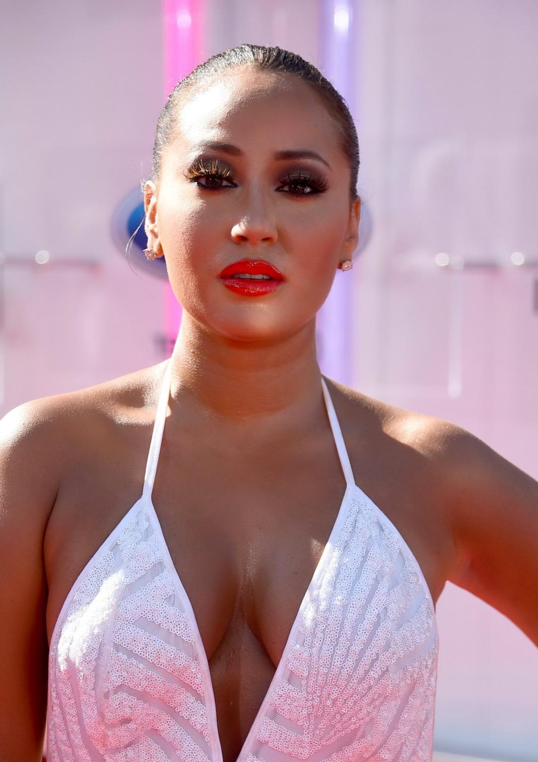 16P Adrienne Bailon shows huge cleavage wearing a bareback maxi dress at the 2014 BE