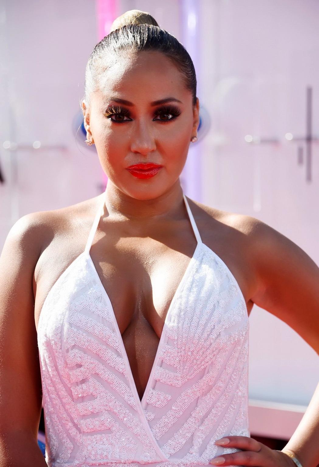 16P Adrienne Bailon shows huge cleavage wearing a bareback maxi dress at the 2014 BE