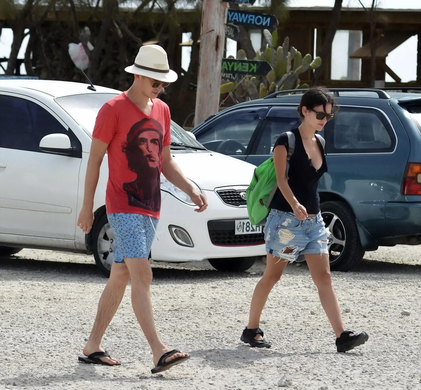 16P Rachel Bilson showing huge cleavage in black top and ripped denim shorts in Barb