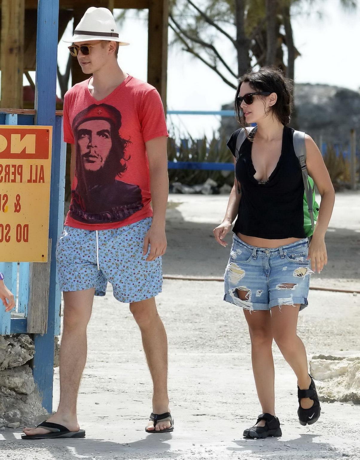 16P Rachel Bilson showing huge cleavage in black top and ripped denim shorts in Barb