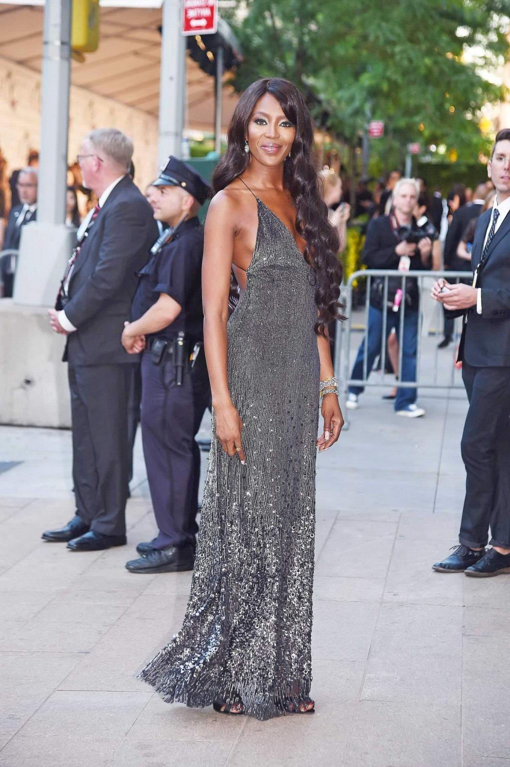 16P Naomi Campbell showing cleavage at the 2014 CFDA Fashion Awards in NYC