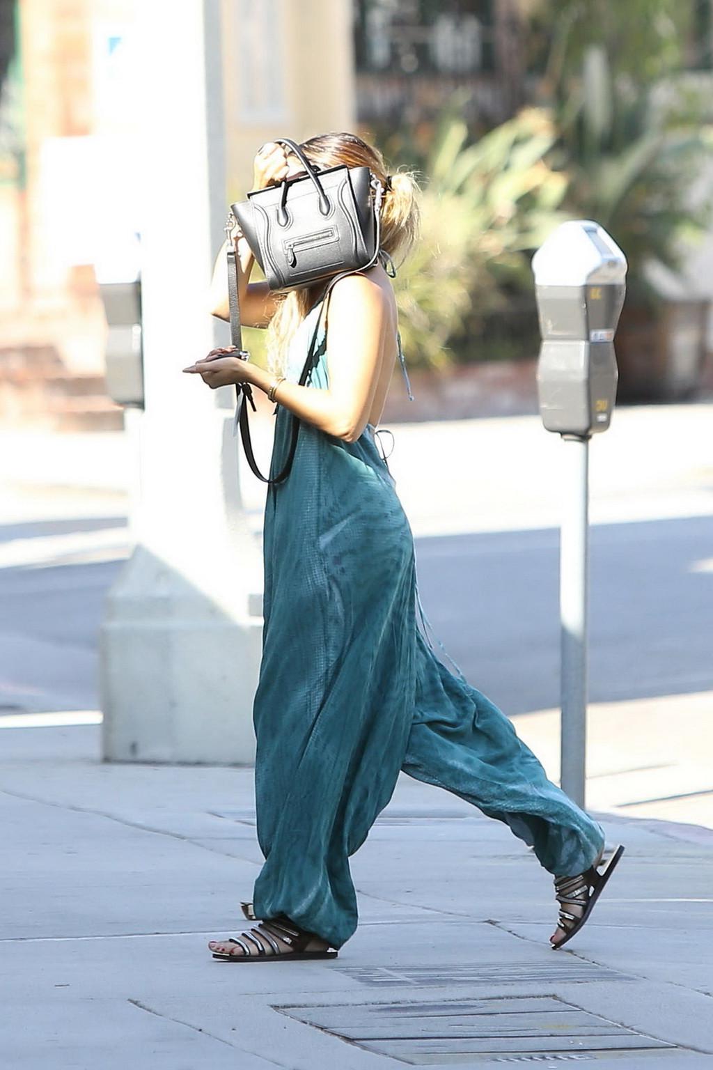 16P Vanessa Hudgens braless showing huge cleavage in blue bareback dress out in Stud