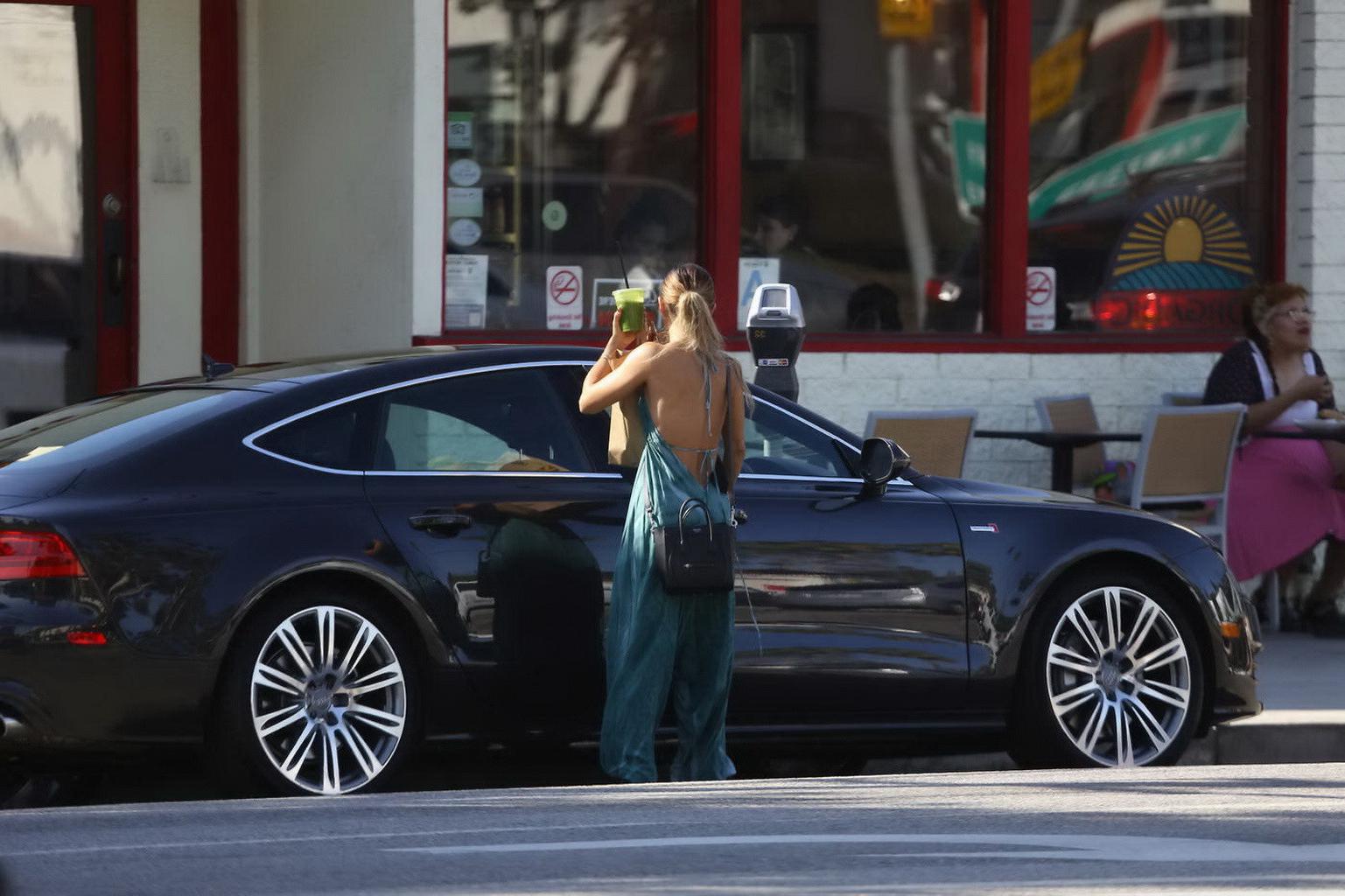 16P Vanessa Hudgens braless showing huge cleavage in blue bareback dress out in Stud