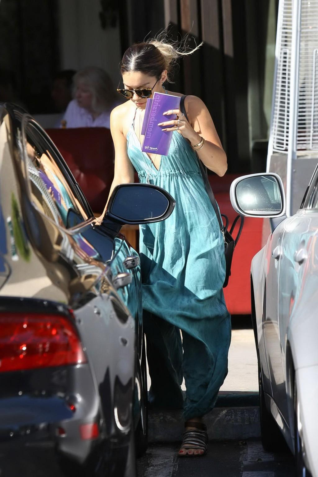 16P Vanessa Hudgens braless showing huge cleavage in blue bareback dress out in Stud