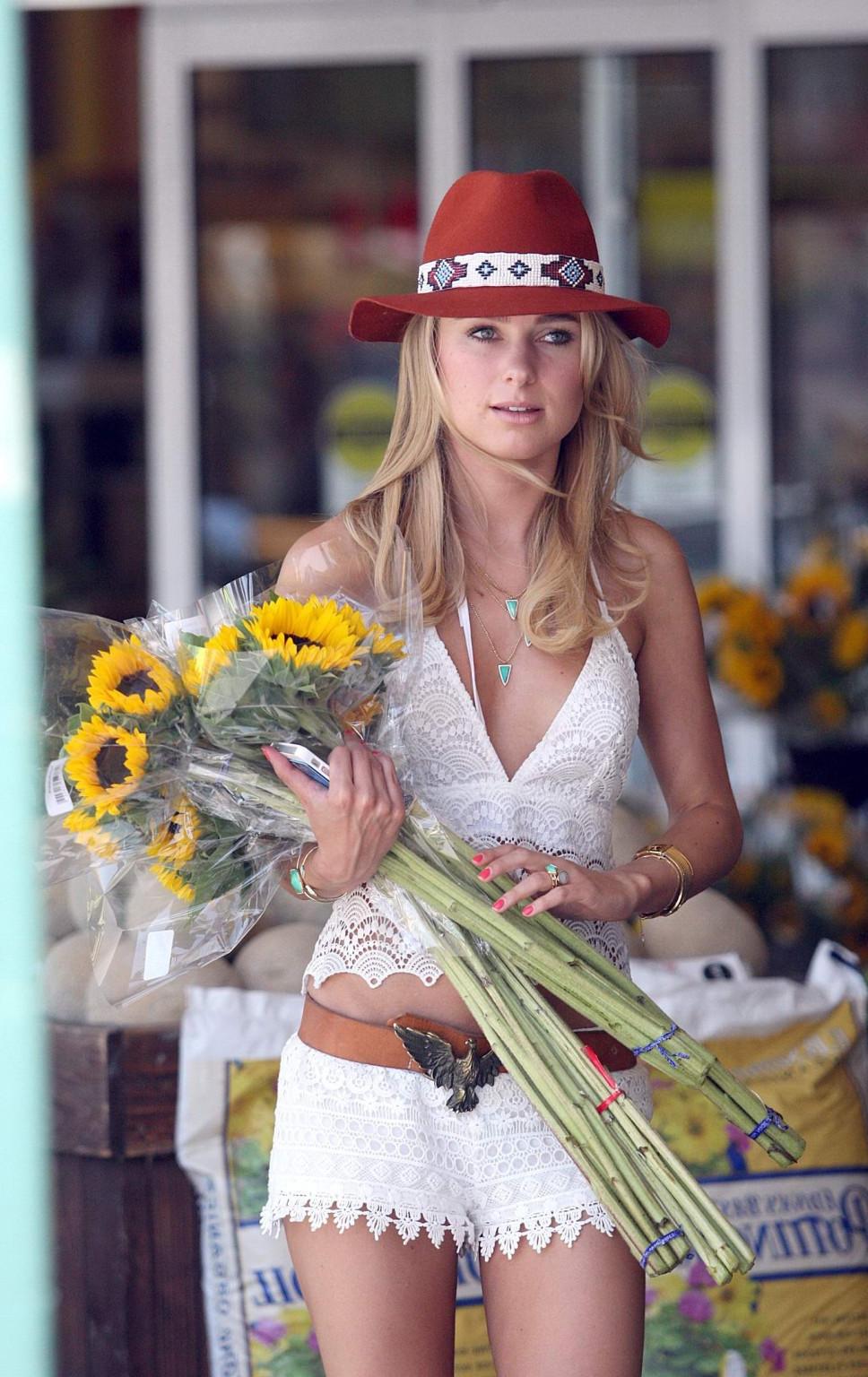 16P Kimberley Garner shows off her ass and sideboob wearing the white lace top and s