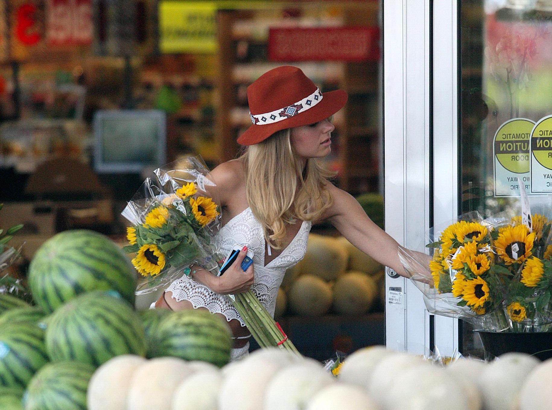 16P Kimberley Garner shows off her ass and sideboob wearing the white lace top and s