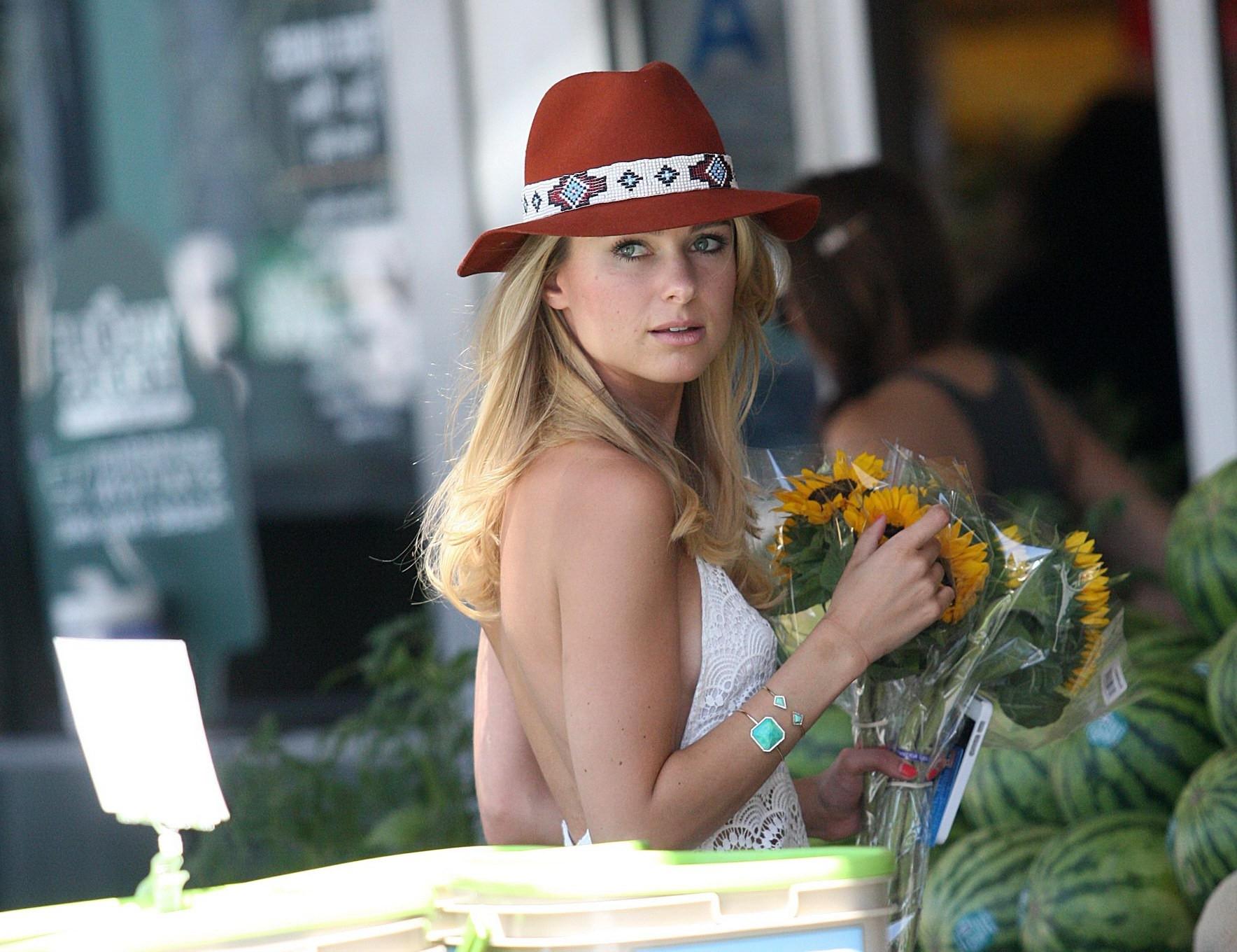 16P Kimberley Garner shows off her ass and sideboob wearing the white lace top and s