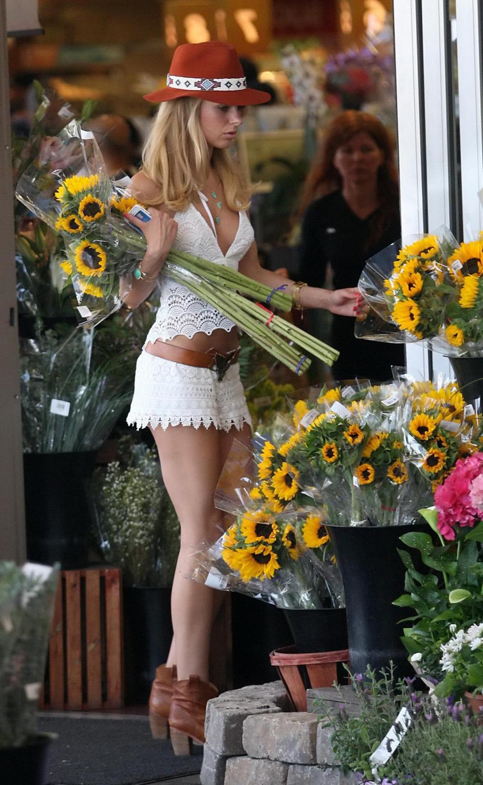 16P Kimberley Garner shows off her ass and sideboob wearing the white lace top and s