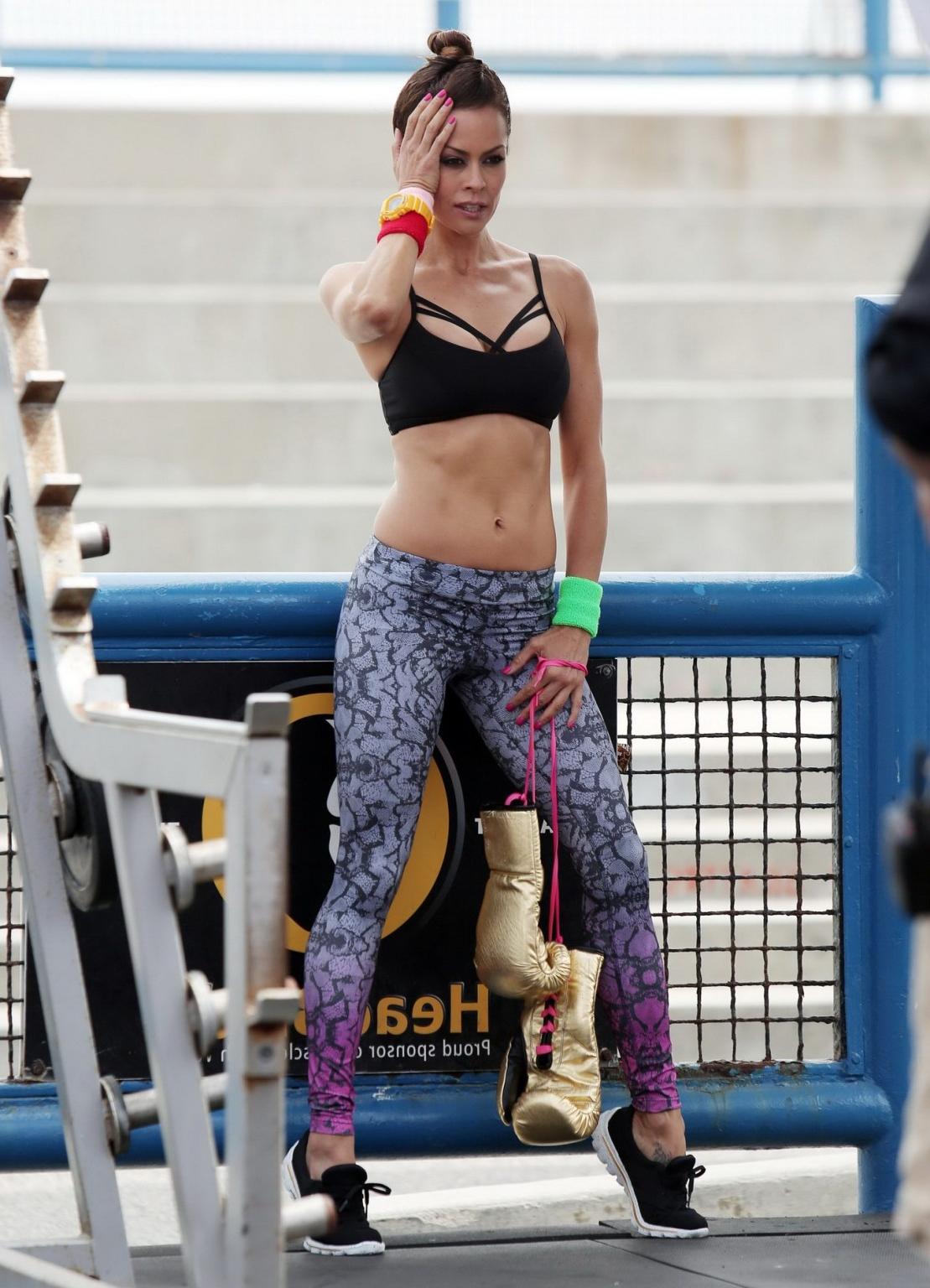 16P Brooke Burke shows huge cleavage wearing sexy sports outfits on the set of a Ske