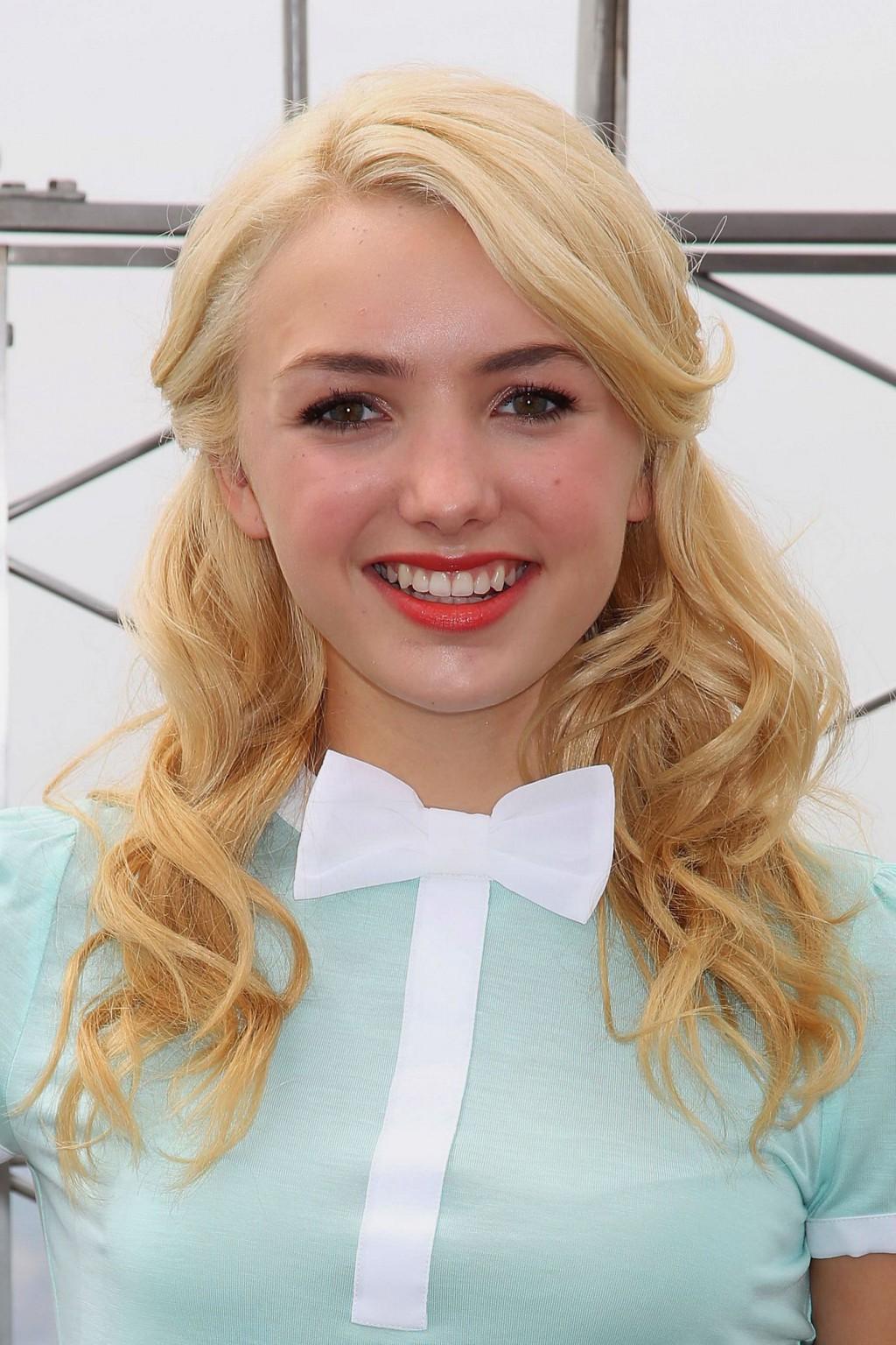 16P Peyton List leggy wearing tiny hot uniform at the Empire State Building Photocal