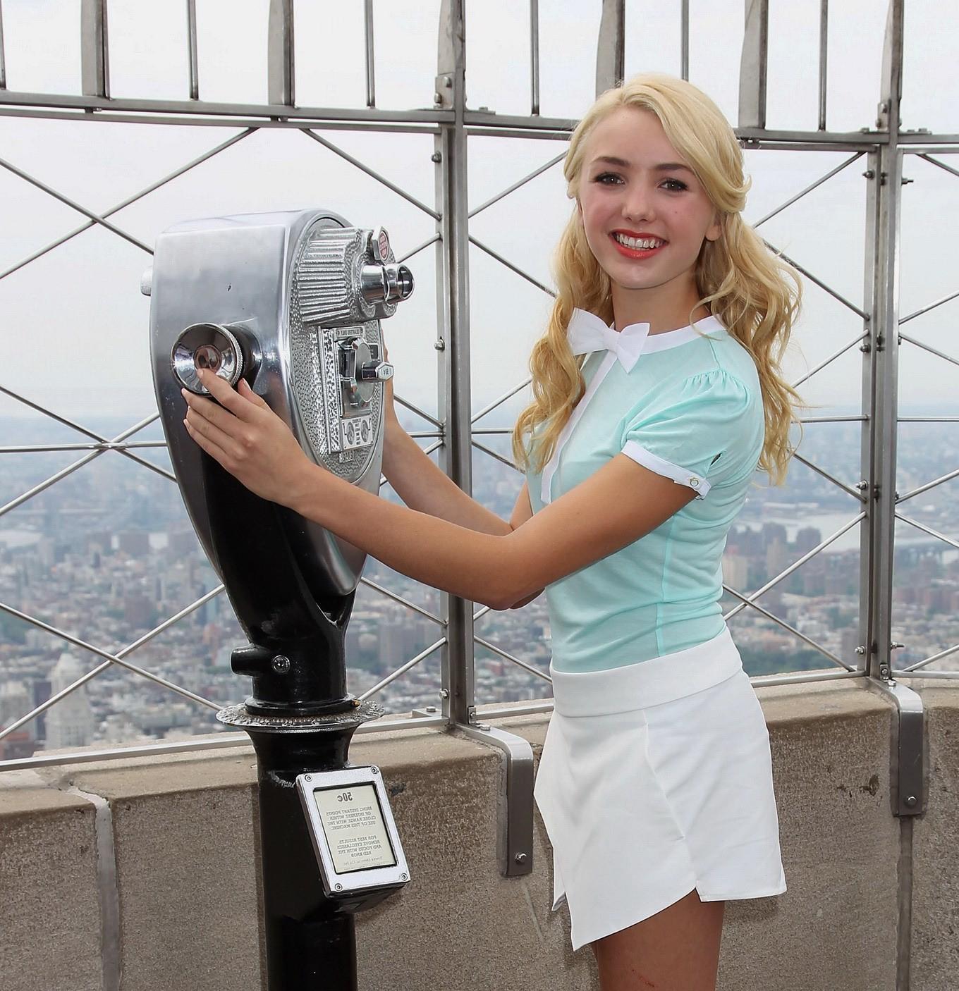 16P Peyton List leggy wearing tiny hot uniform at the Empire State Building Photocal
