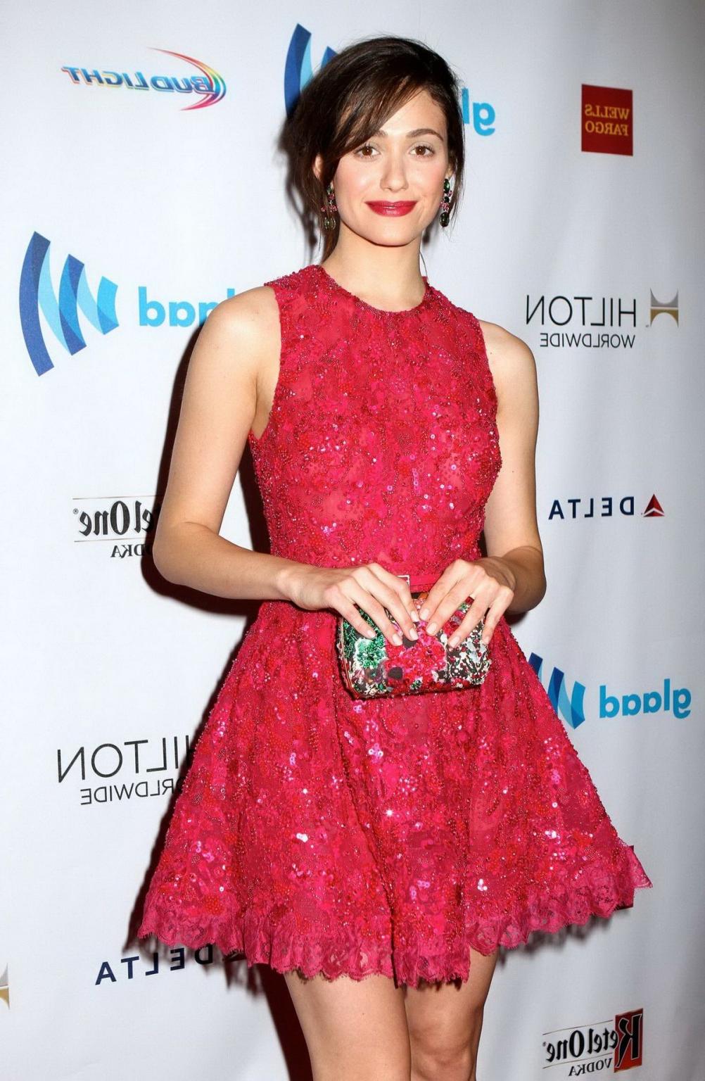 16P Emmy Rossum leggy wearing slightly transparent red lace mini dress in NYC