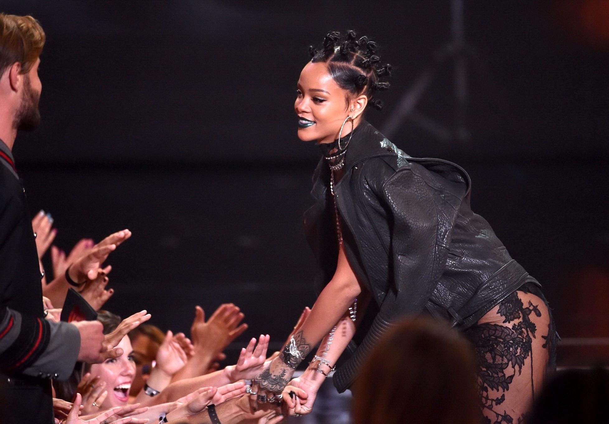 15P Rihanna wearing black panties and lace dress at the 2014 iHeartRadio Music Award