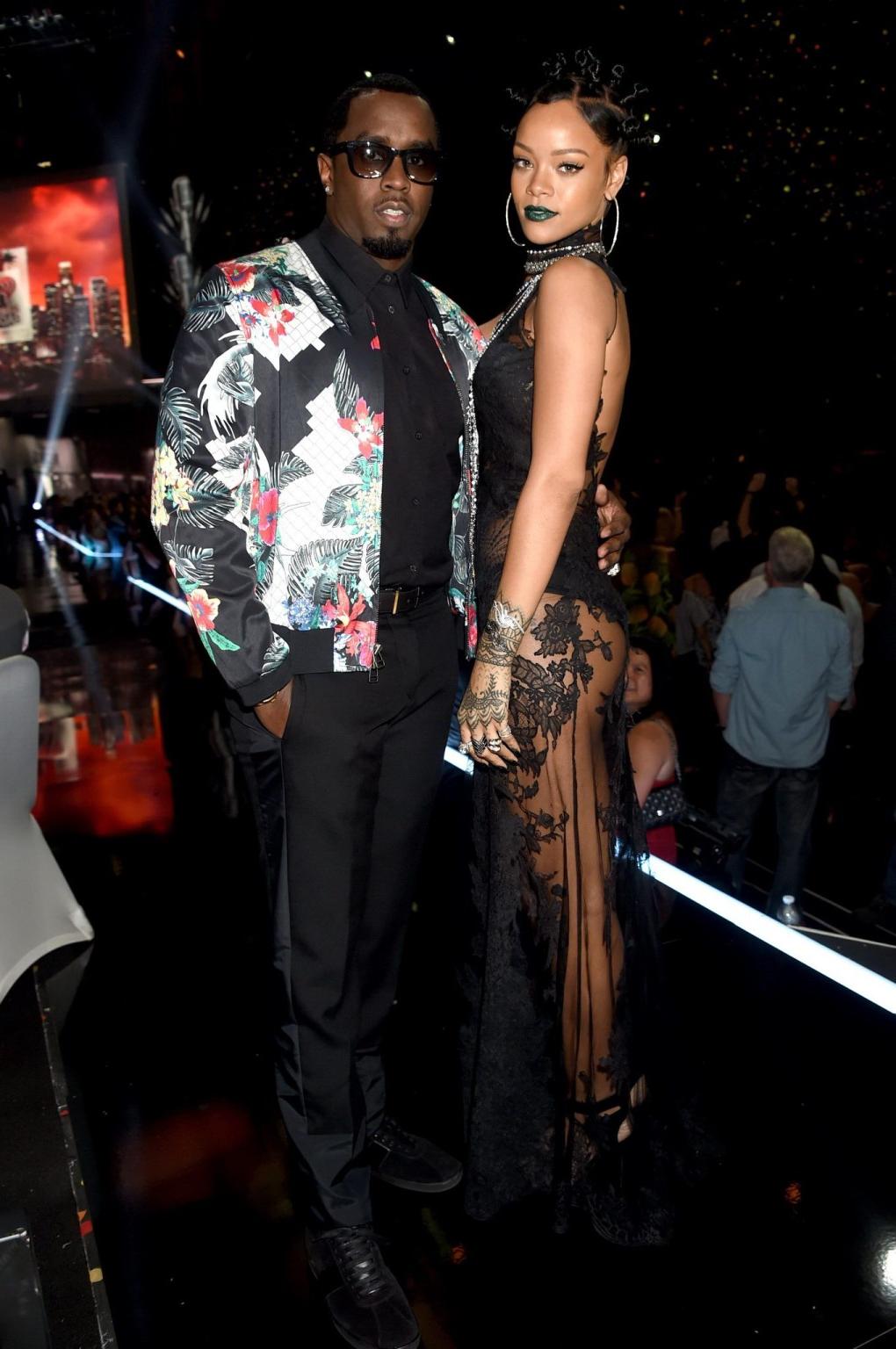 15P Rihanna wearing black panties and lace dress at the 2014 iHeartRadio Music Award