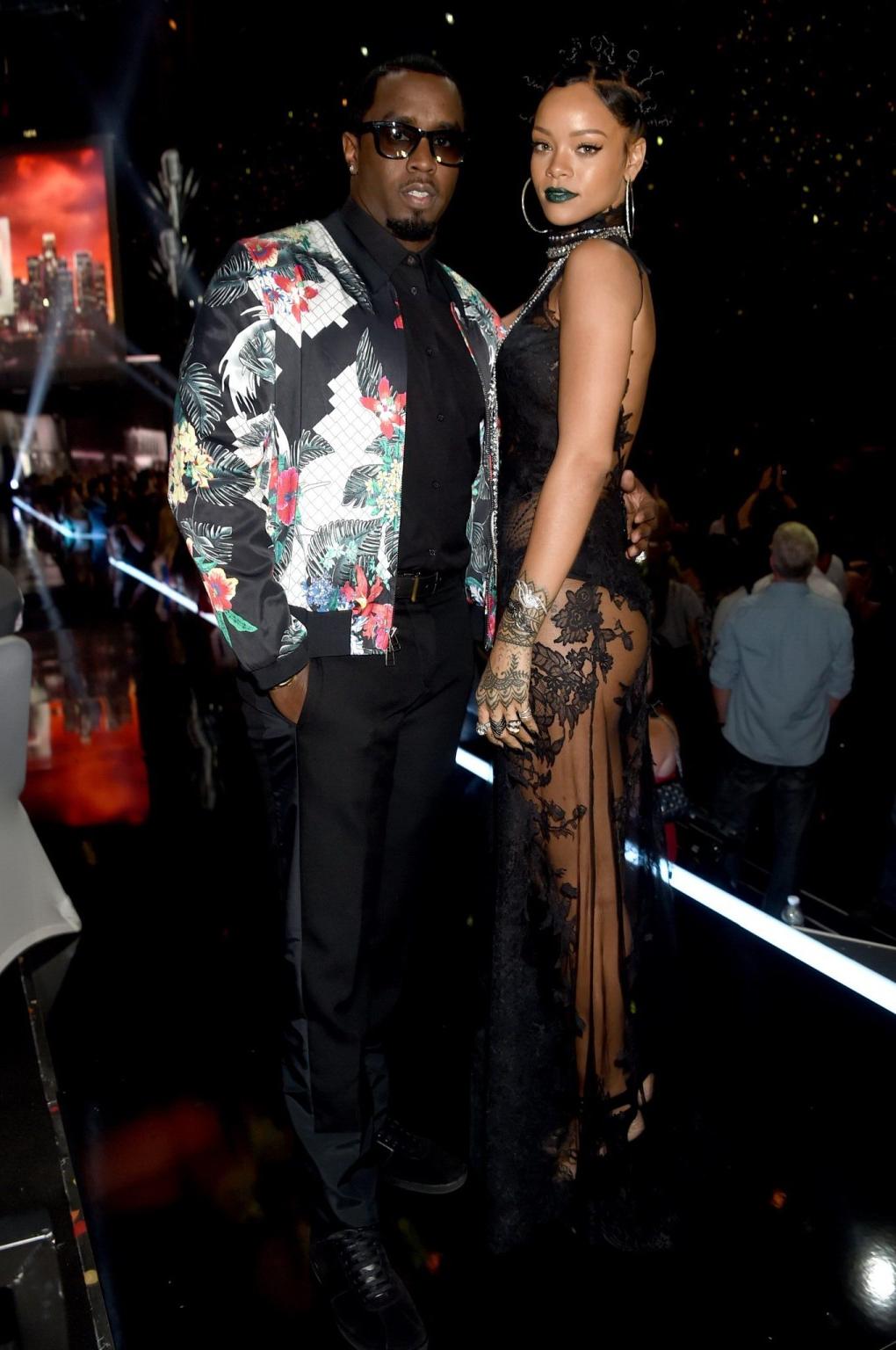 15P Rihanna wearing black panties and lace dress at the 2014 iHeartRadio Music Award