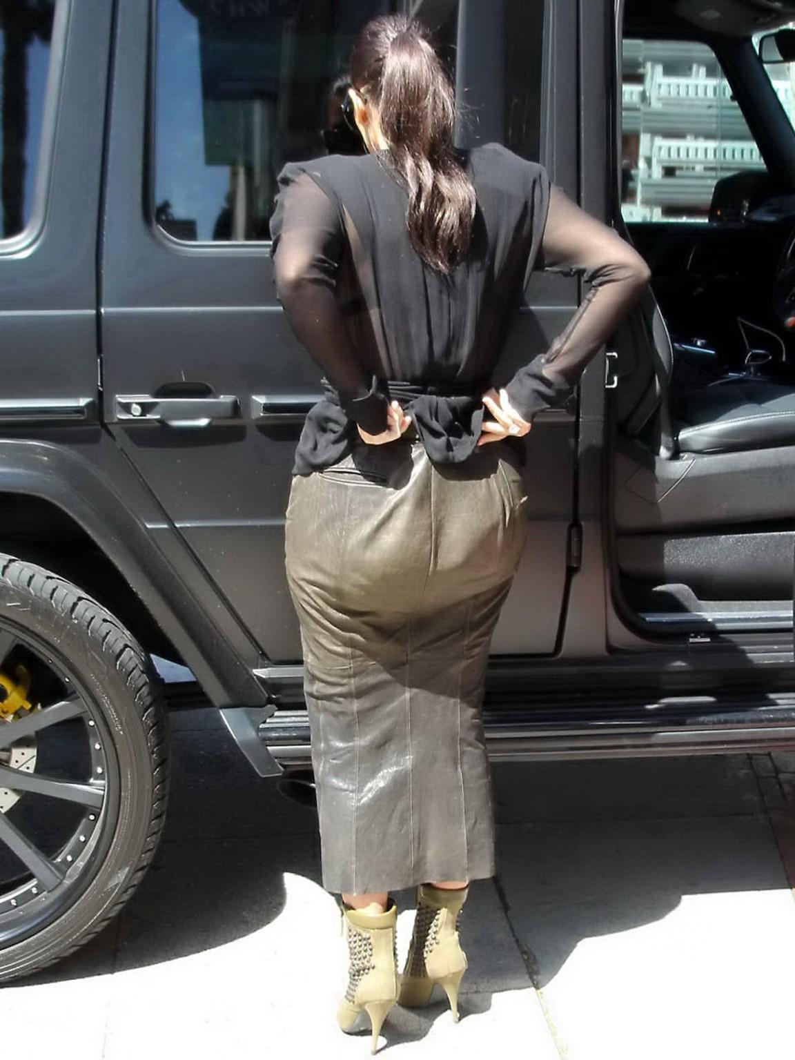16P Kim Kardashian shows cleavage and booty while shopping at Canyon Beachwear