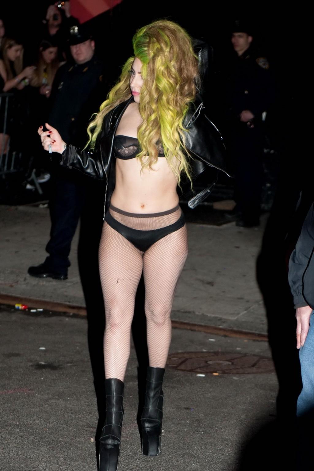 16P Lady Gaga shows off her ass in fishnets and lingerie in public