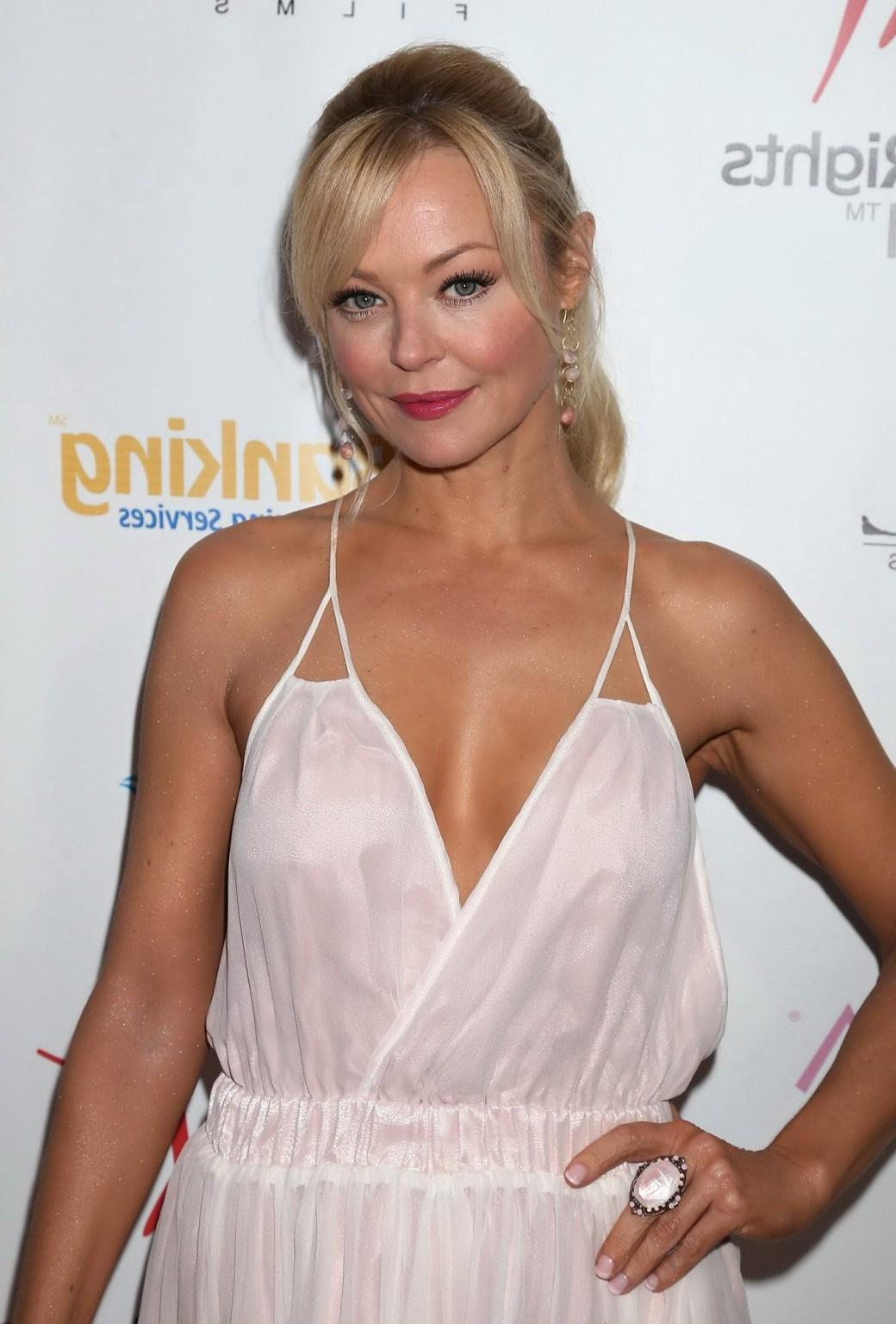 16P Charlotte Ross braless shows big cleavage in white low cut lace mini dress