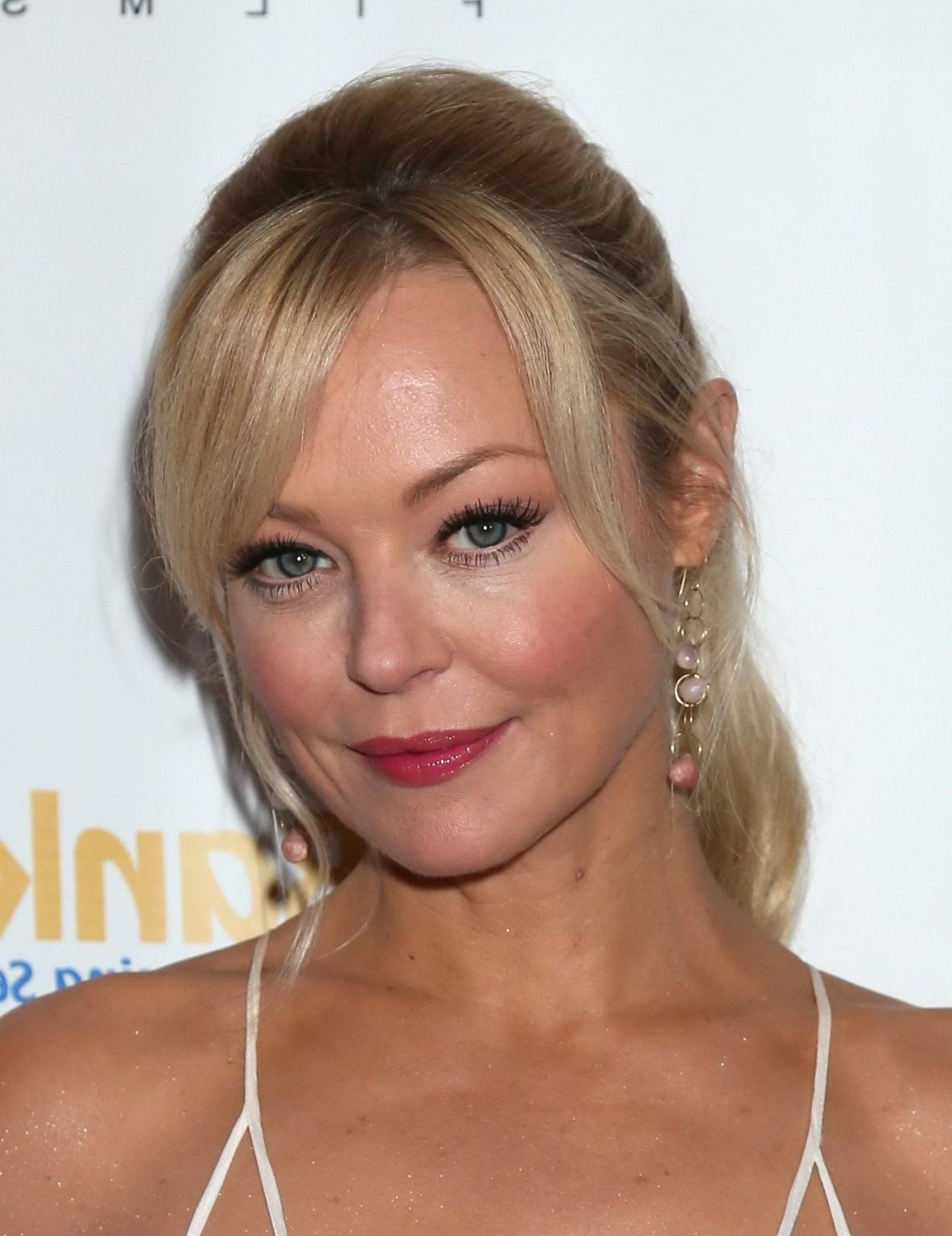 16P Charlotte Ross braless shows big cleavage in white low cut lace mini dress