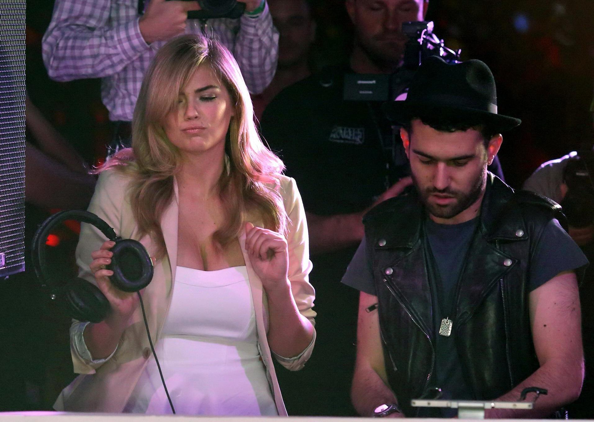 16P Kate Upton leggy  showing huge cleavage at the Express runway fashion show in Mi