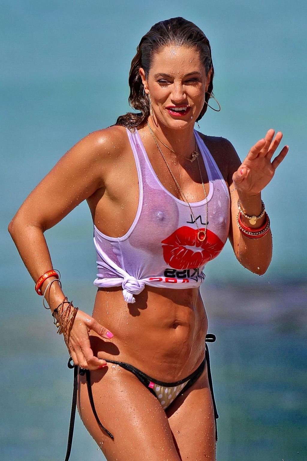 16P Jennifer Nicole Lee shows off her boobs and ass wearing a bikini bottom and a we