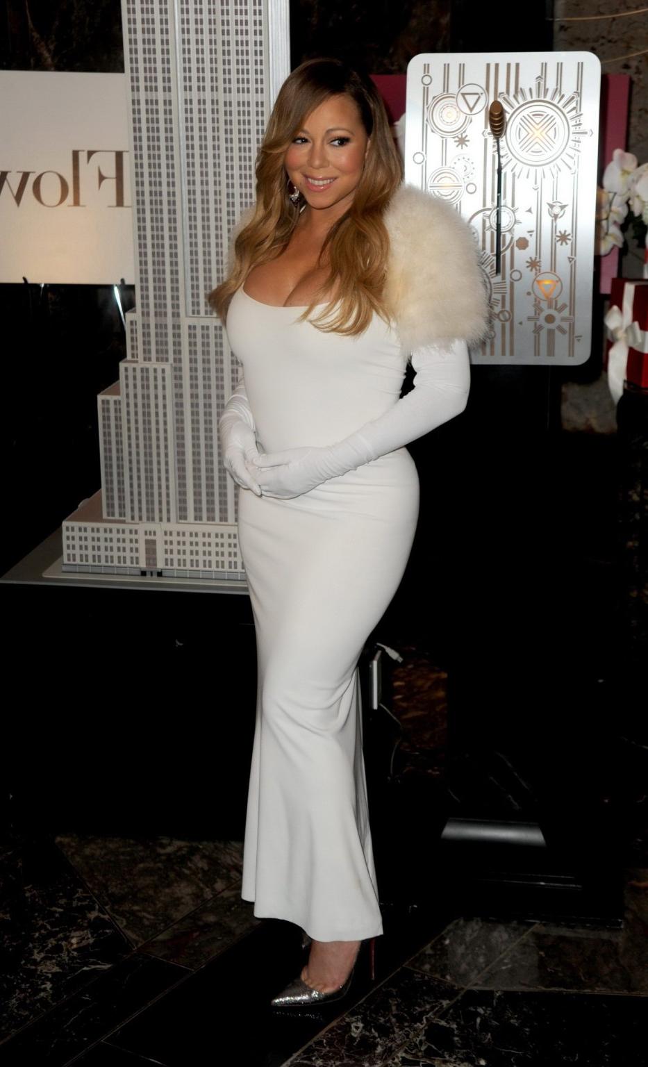 16P Mariah Carey showing huge cleavage at The Empire State Building 20th Annual Vale