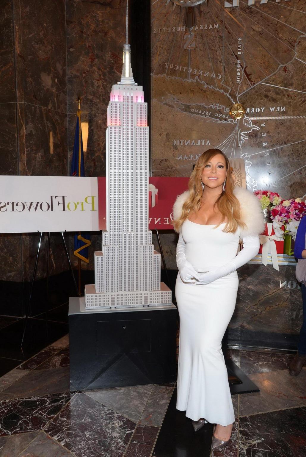 16P Mariah Carey showing huge cleavage at The Empire State Building 20th Annual Vale