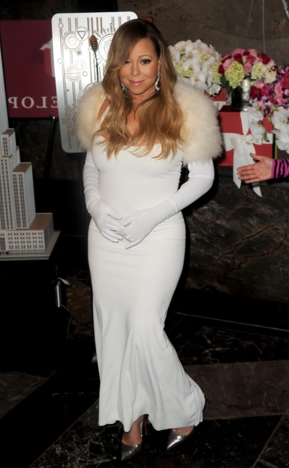 16P Mariah Carey showing huge cleavage at The Empire State Building 20th Annual Vale