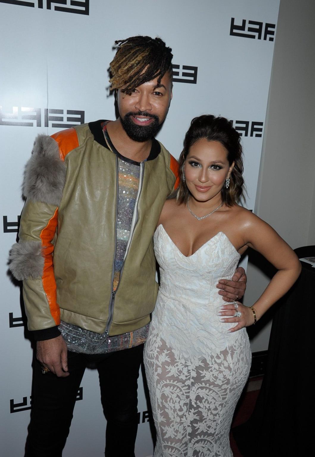 16P Adrienne Bailon showing huge cleavage at the  Effy Jewelry's 35th Anniversary Pa