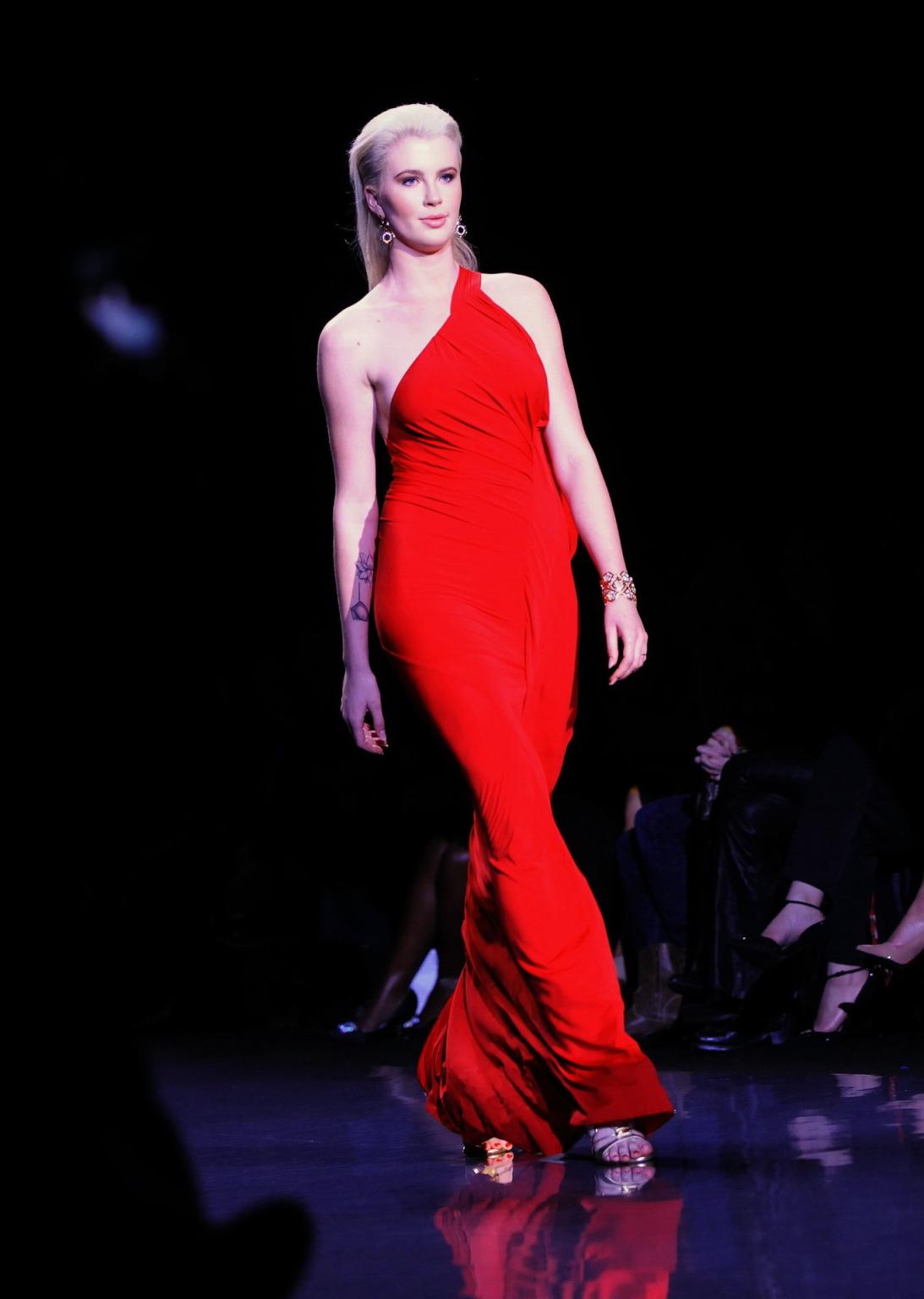 16P Ireland Baldwin braless in a revealing dress at The Heart Truth Red Dress Collec