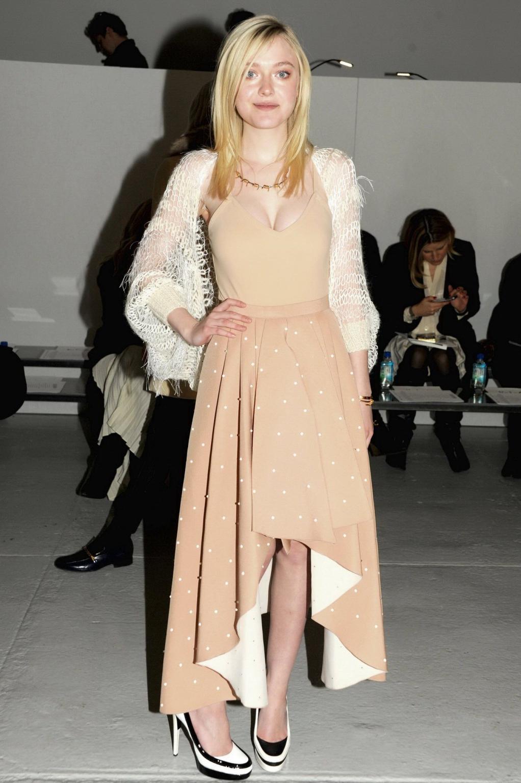 16P Dakota Fanning braless showing big cleavage in a flesh colored top and skirt at 