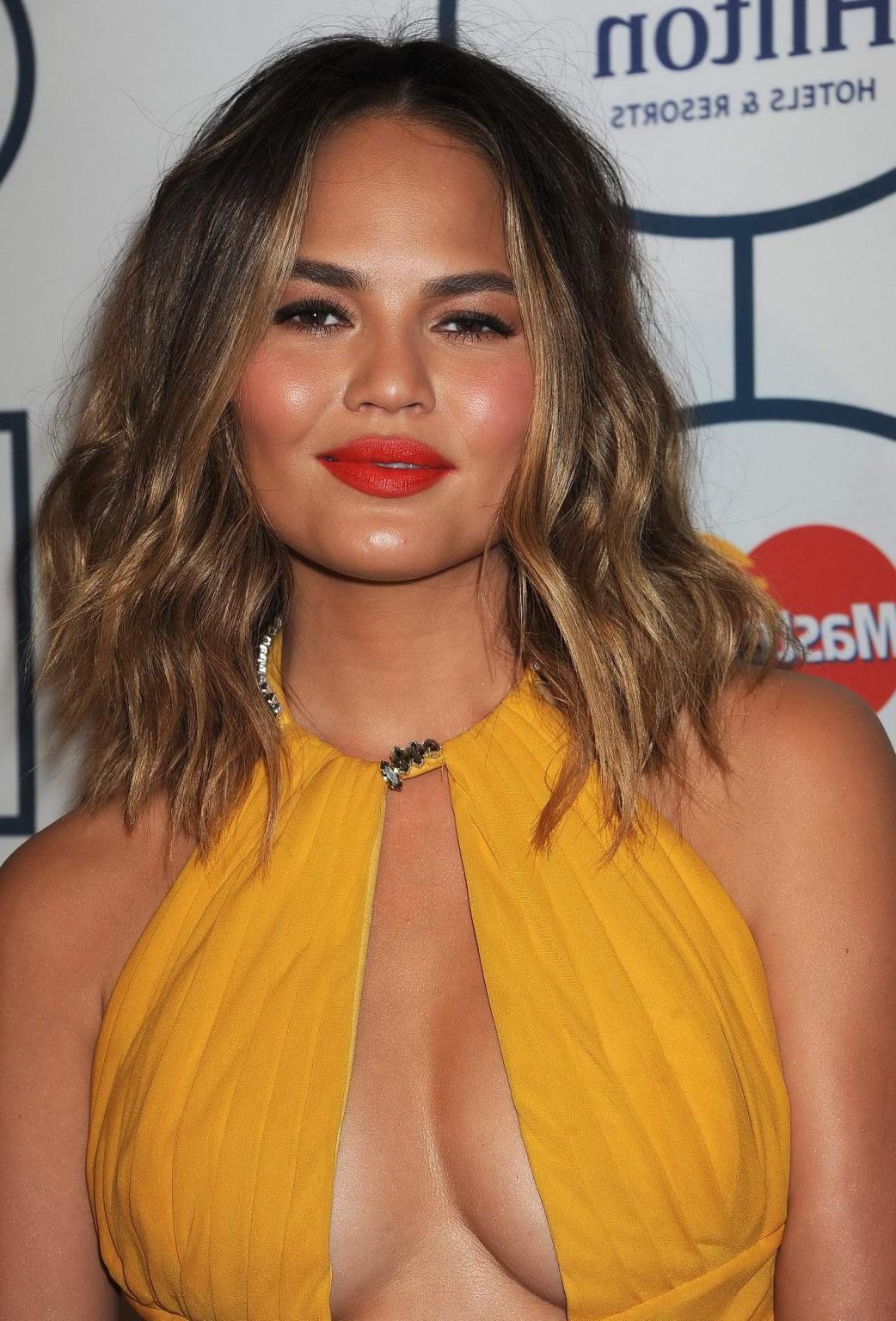 16P Chrissy Teigen showing huge cleavage at the 56th Annual GRAMMY Awards Pre-GRAMMY