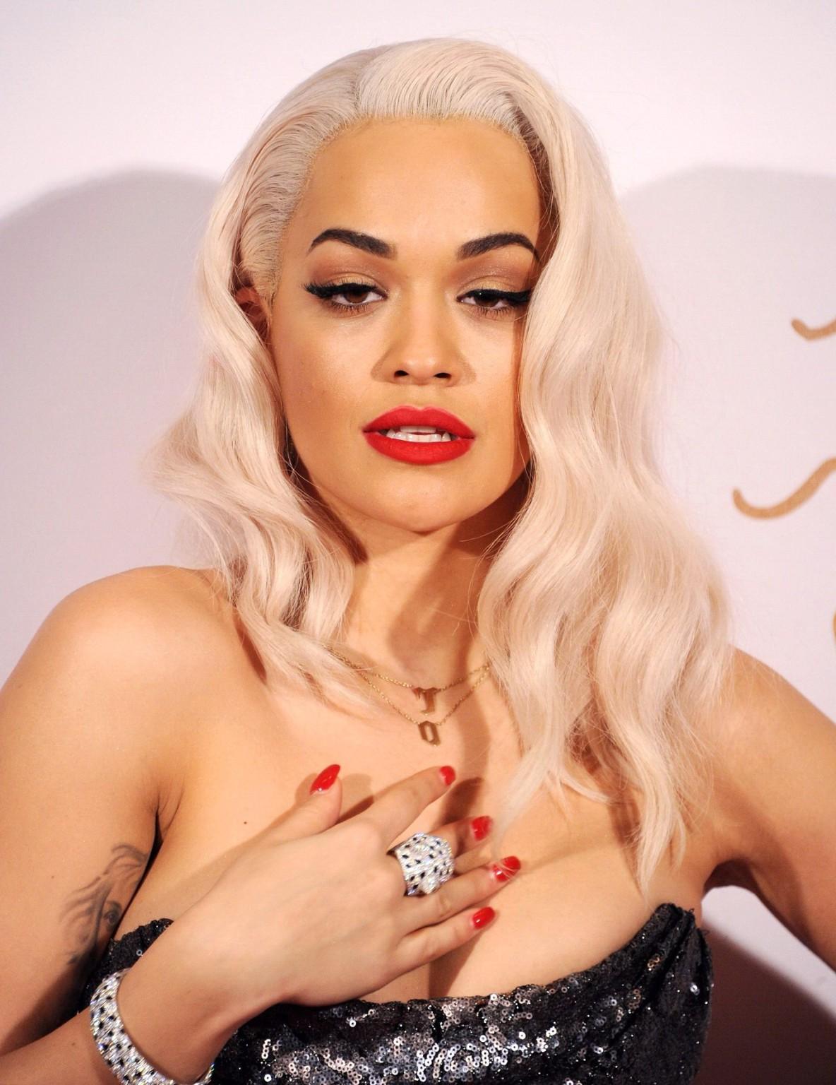 16P Busty Rita Ora wearing a strapless maxi dress at the 2013 British Fashion Awards