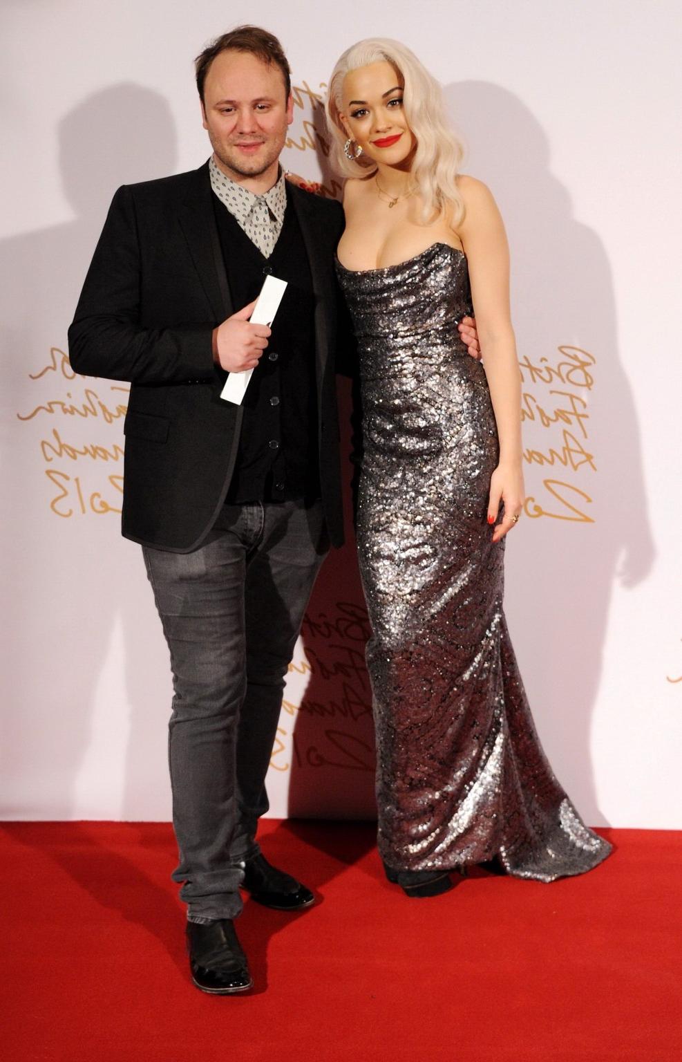 16P Busty Rita Ora wearing a strapless maxi dress at the 2013 British Fashion Awards