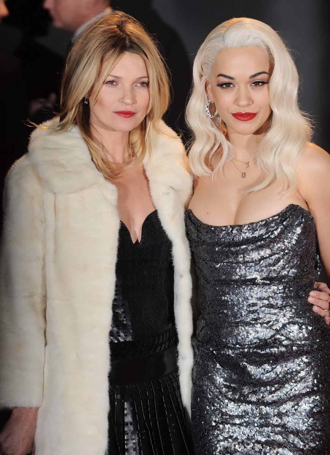 16P Busty Rita Ora wearing a strapless maxi dress at the 2013 British Fashion Awards