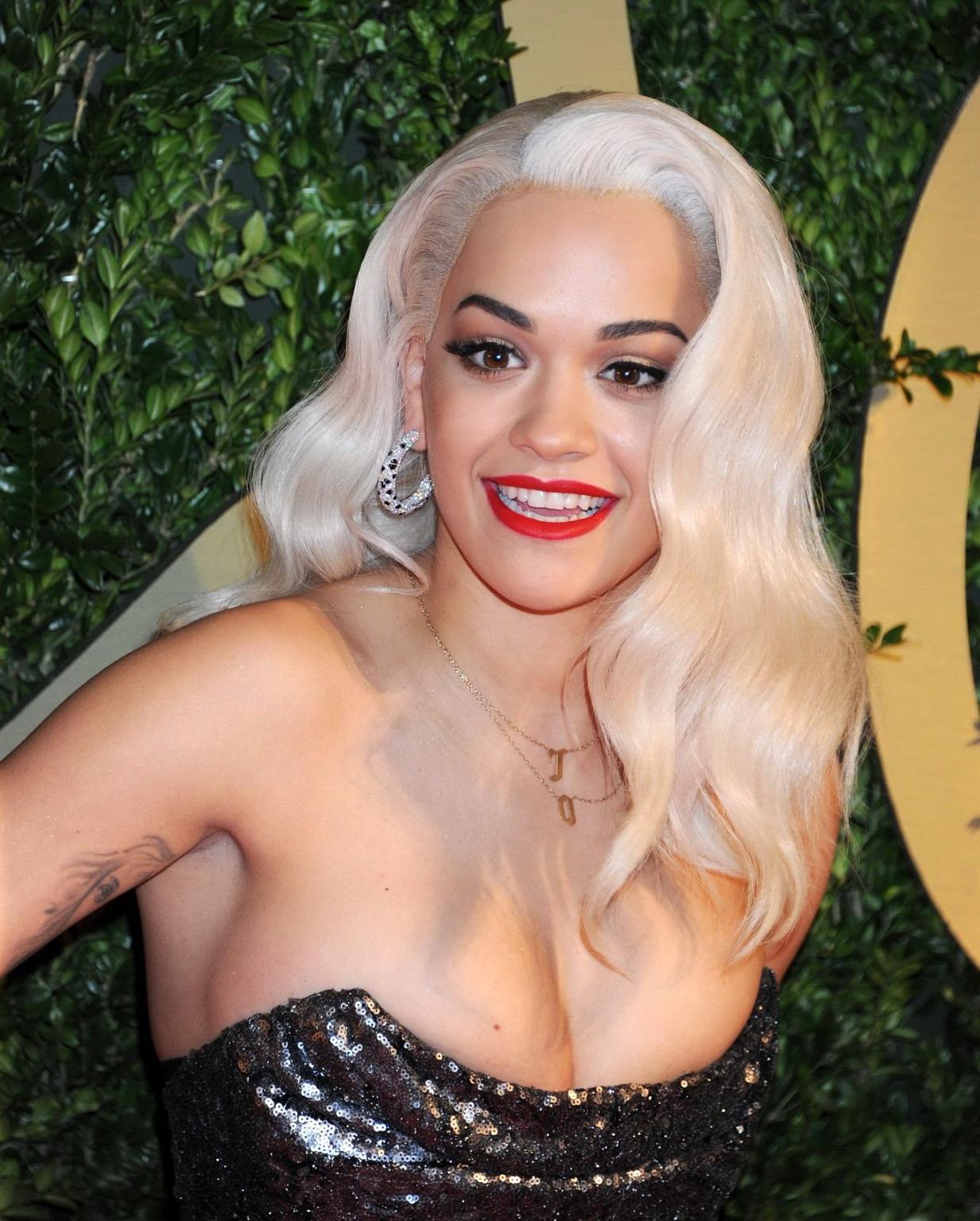 16P Busty Rita Ora wearing a strapless maxi dress at the 2013 British Fashion Awards