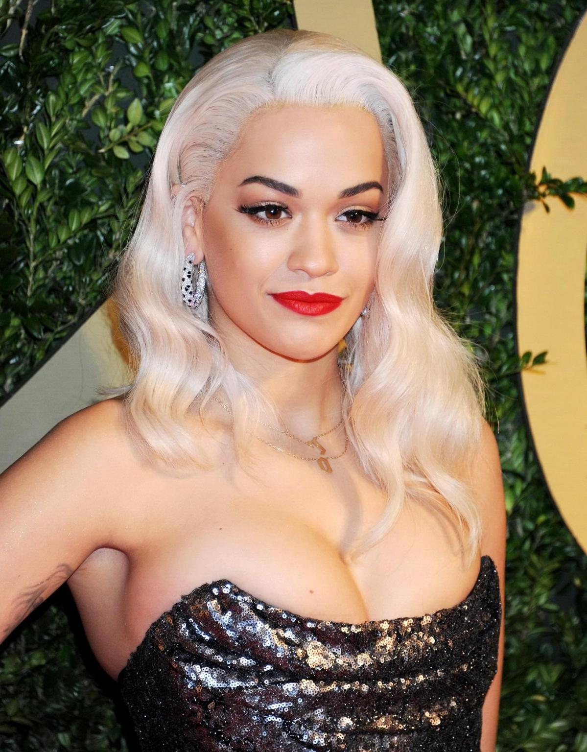 16P Busty Rita Ora wearing a strapless maxi dress at the 2013 British Fashion Awards