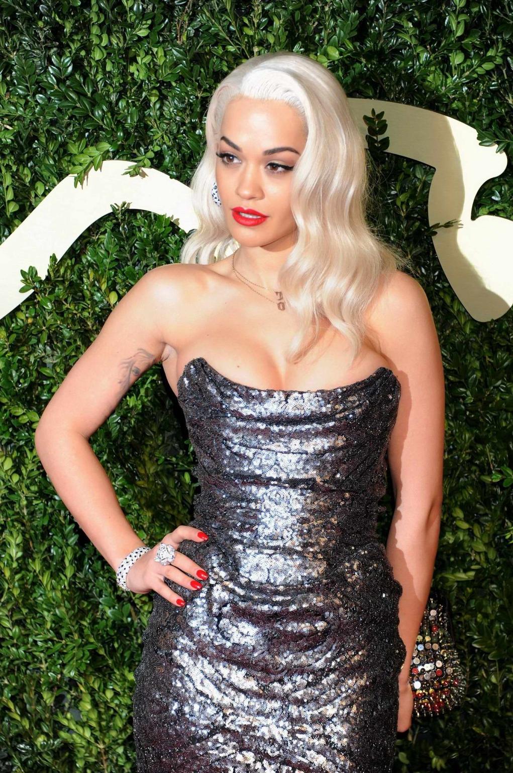 16P Busty Rita Ora wearing a strapless maxi dress at the 2013 British Fashion Awards