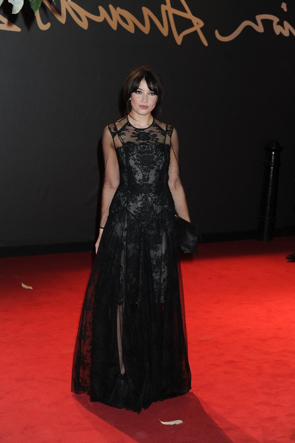 16P Daisy Lowe wearing black partially see-through dress at The British Fashion Awar