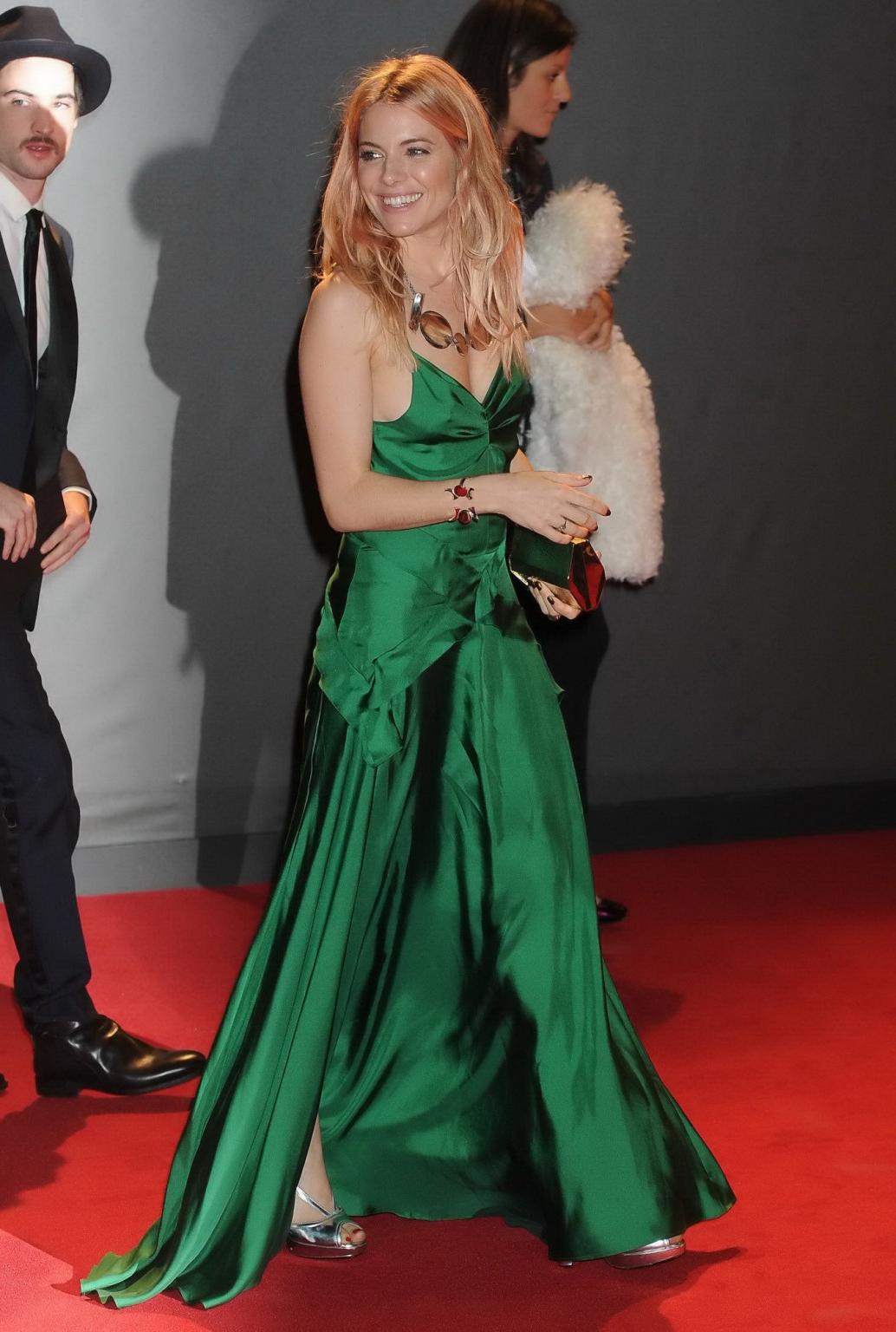 16P Sienna Miller shows huge cleavage braless in a high slit green dress at the 2013