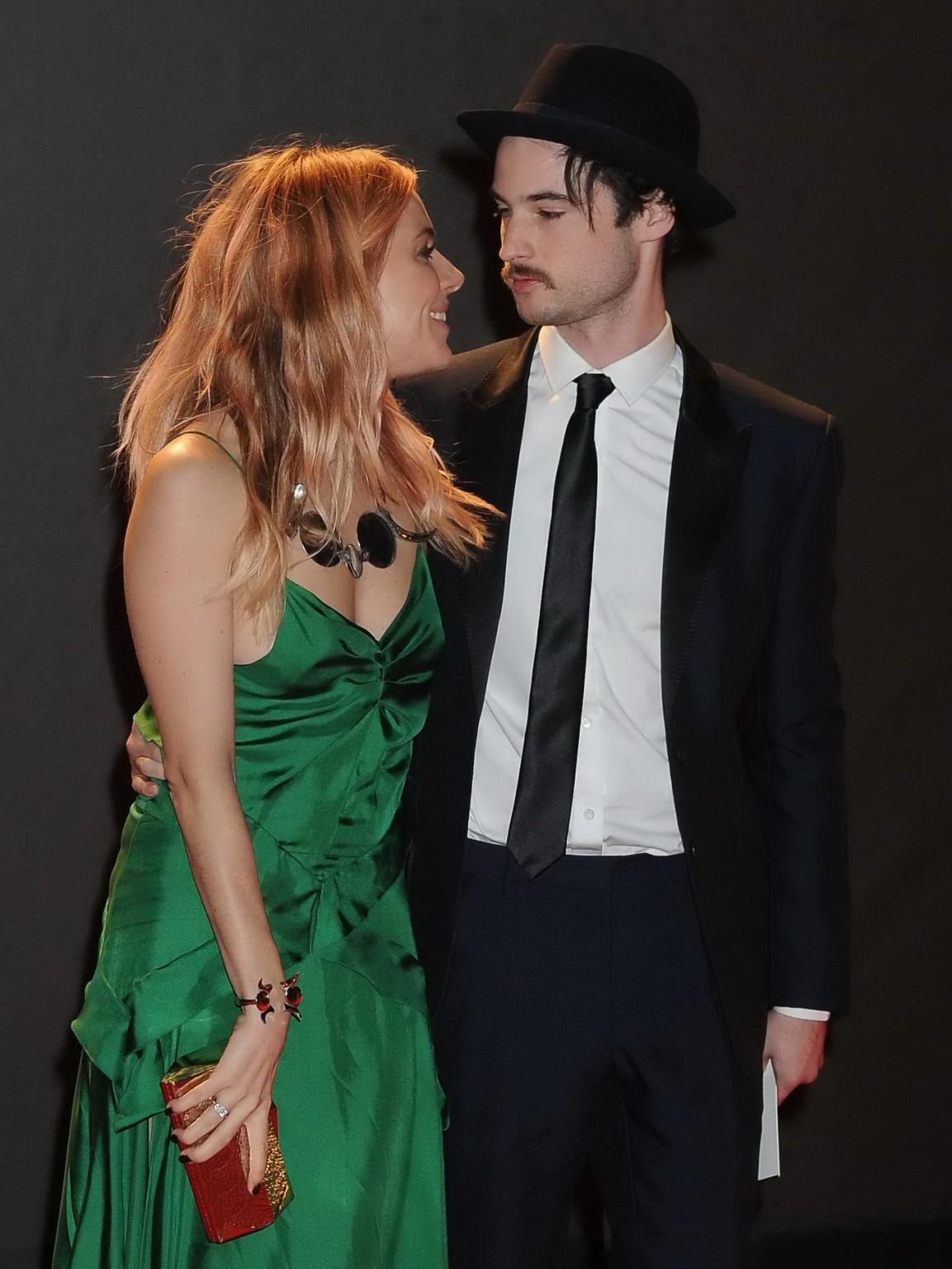 16P Sienna Miller shows huge cleavage braless in a high slit green dress at the 2013